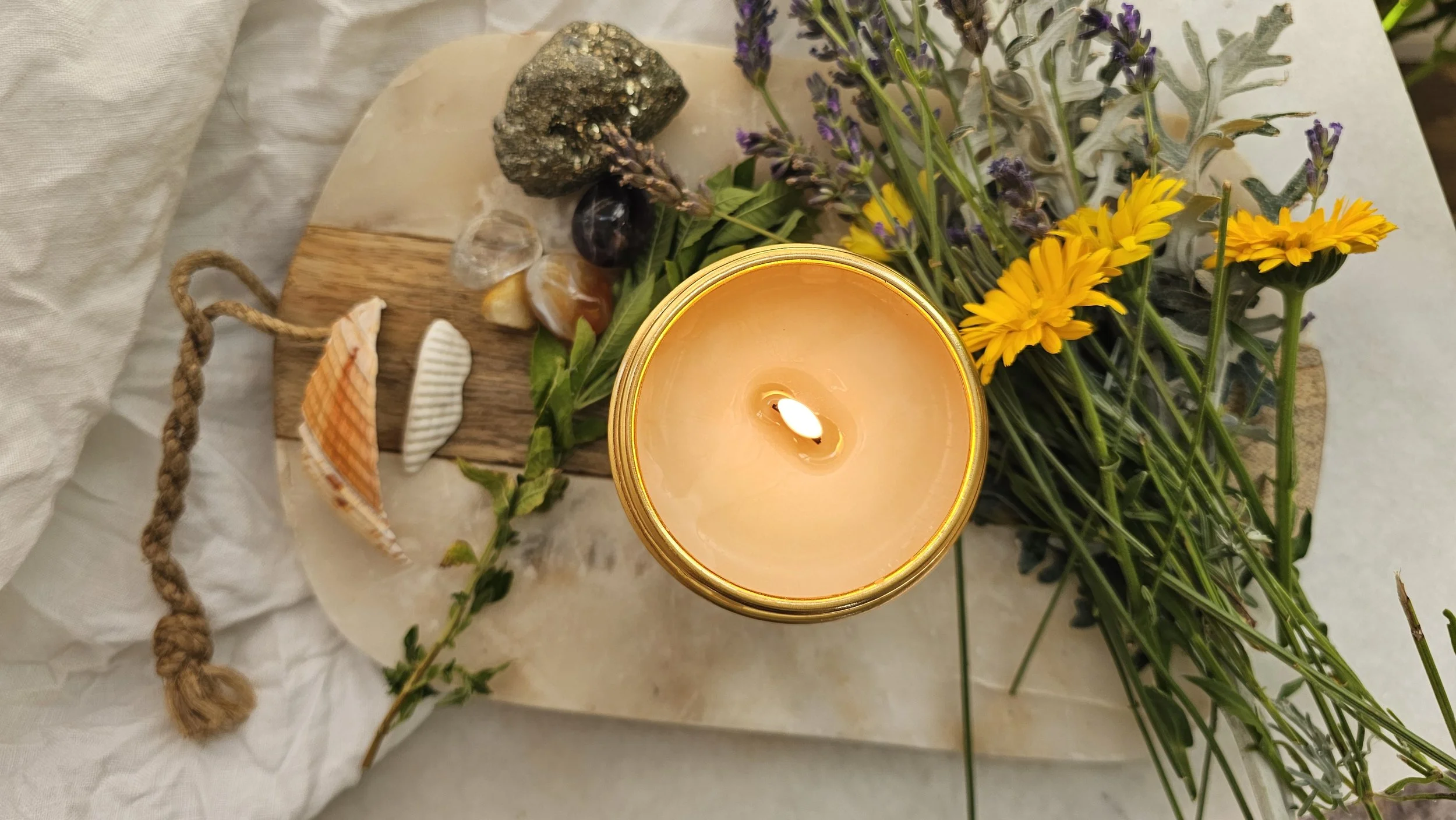 Belle Terre Lavender lemon verbena candle lit with wildflowers
