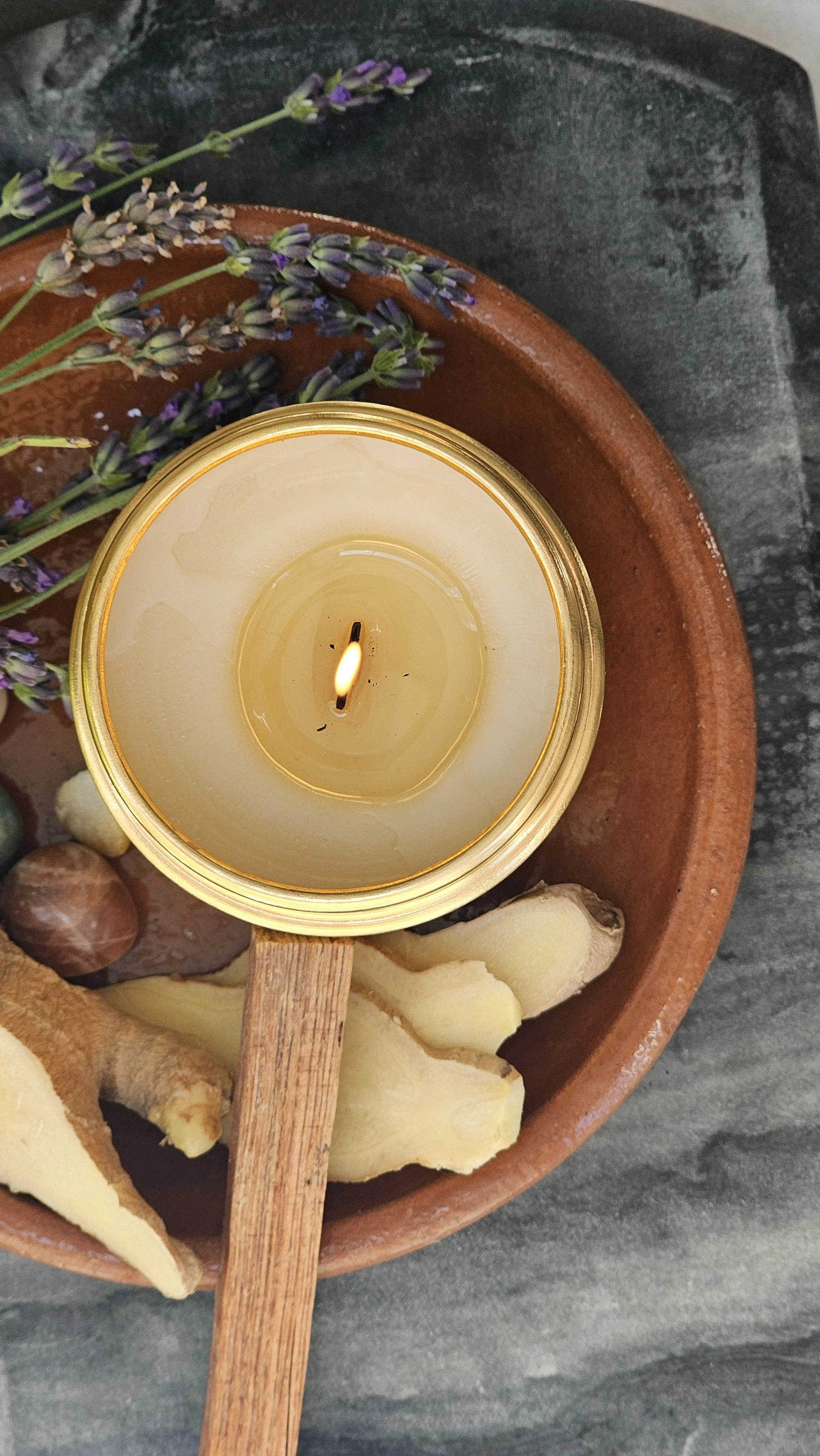 Belle Terre Lavender ginger cedarwood candle lit with fresh ginger