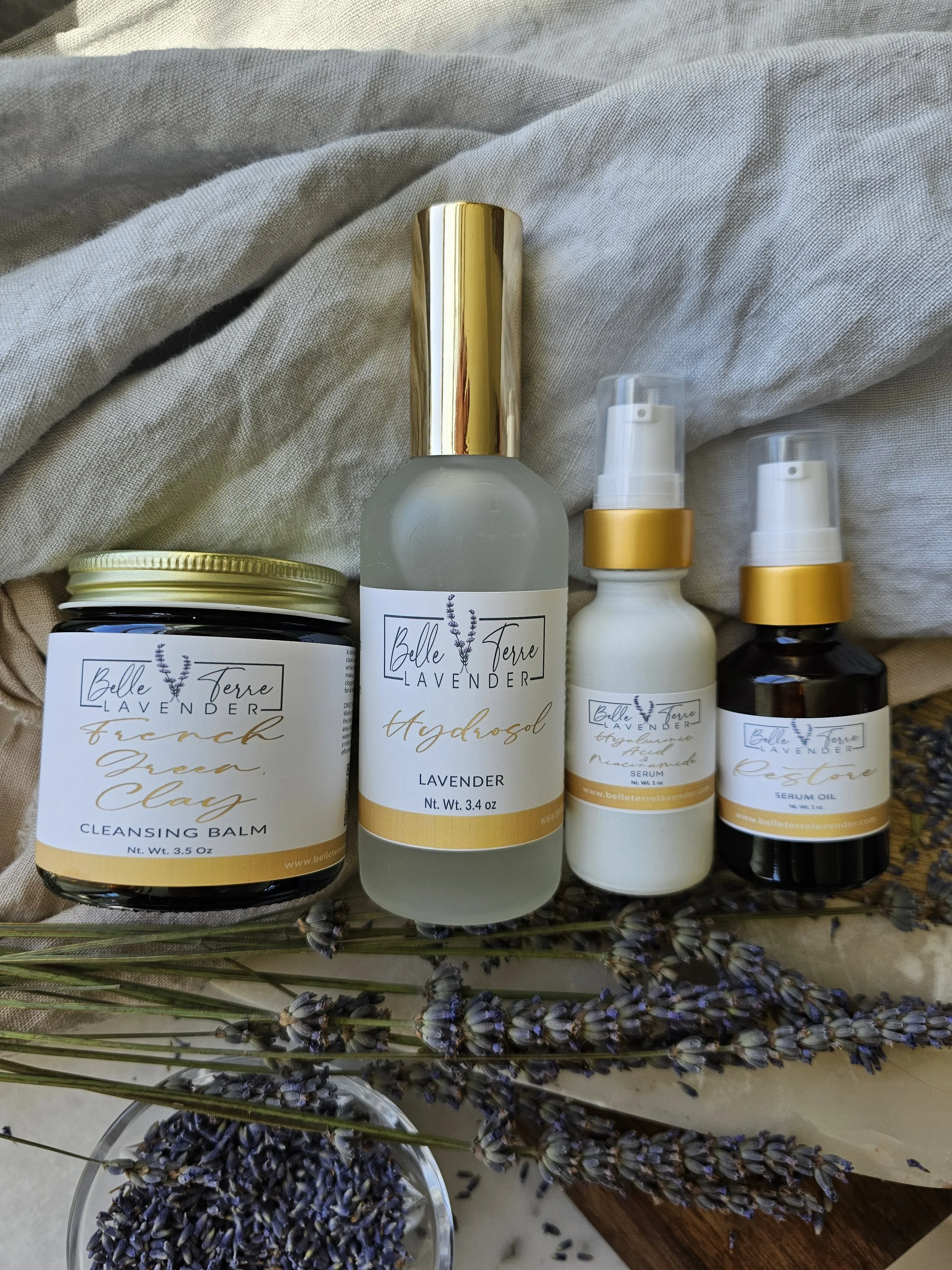 Belle Terre Lavender Renewal Collection with Restore Facial Oil and dried lavender