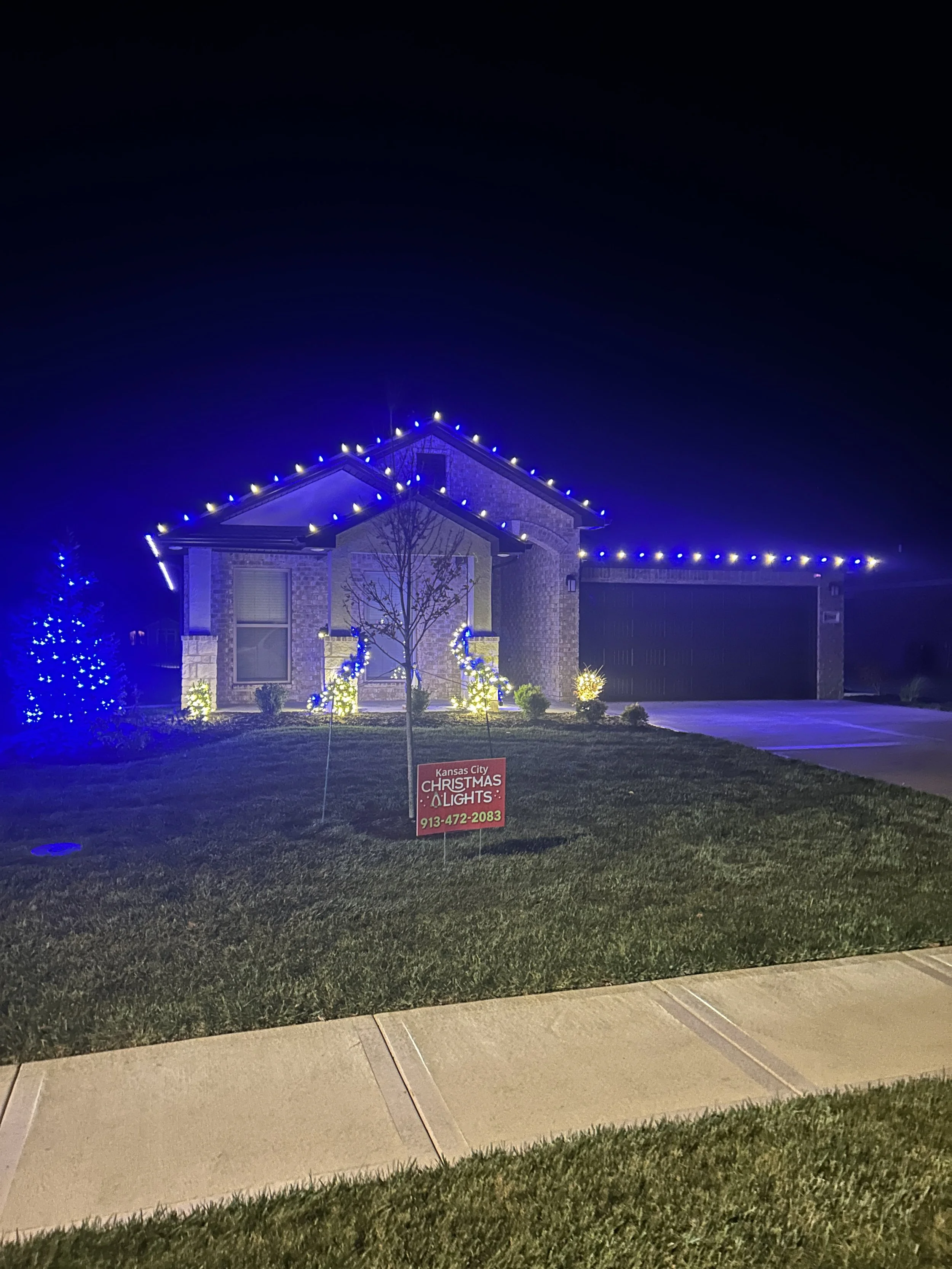 Front peaks wrapped with small bushes and garland