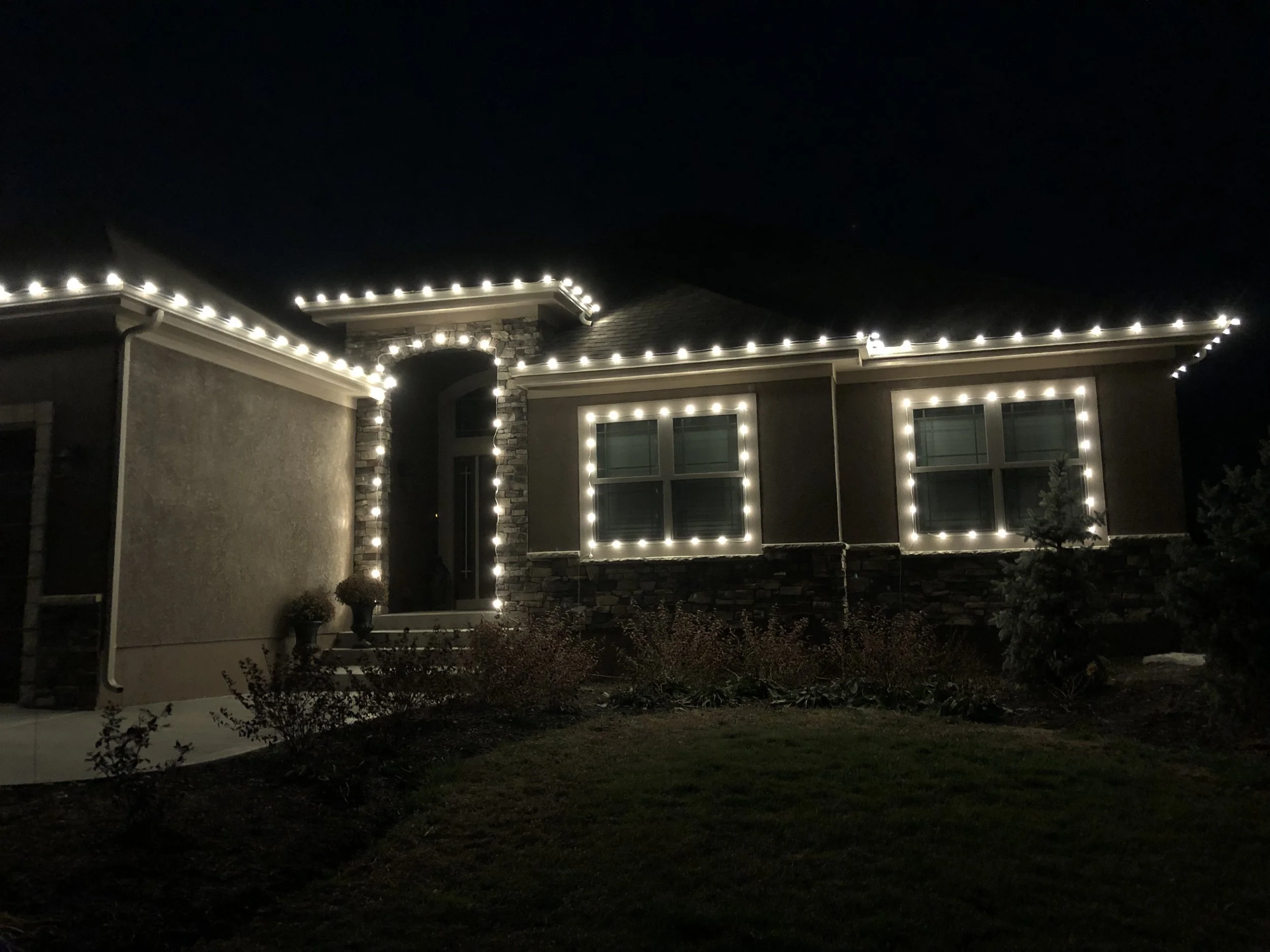 roofline lighting with additional entryway and window outlines