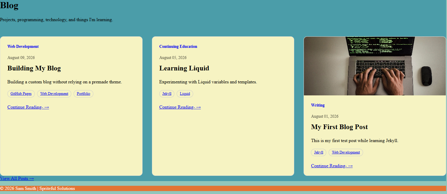 Screenshot of a personal blog homepage displaying three blog posts, including titles, dates, and descriptions along with a photograph of a person typing on a laptop with green code on the screen.