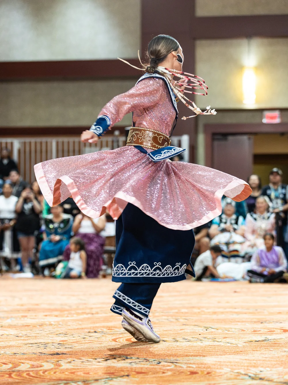 Dancer in colorful regalia at the Marvin Joe Curry Seneca Veterans Powwow.