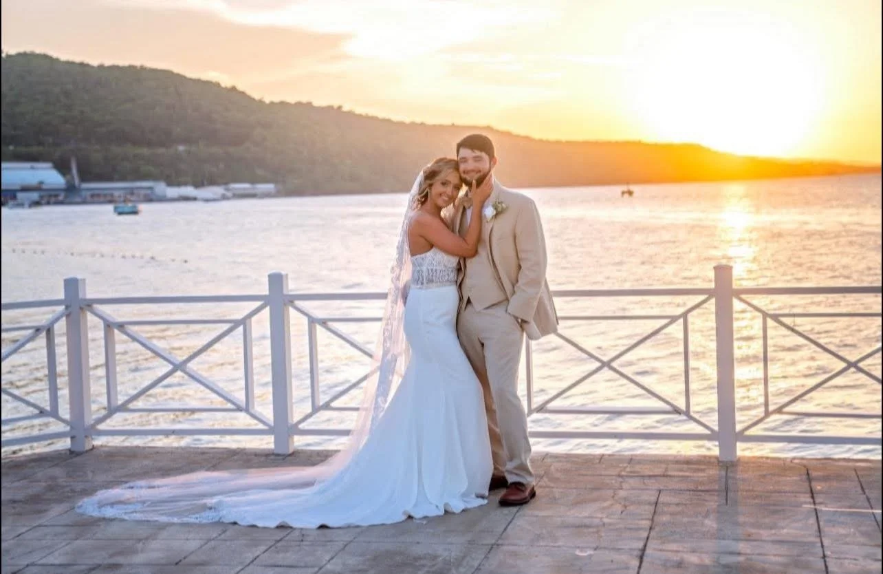 A newlywed couple at sunset at their destination wedding at Moon Palace Jamaica