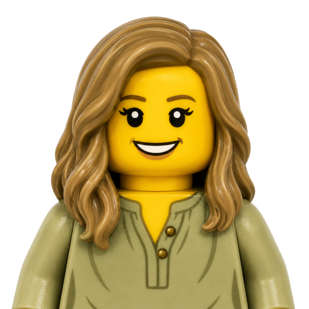 Lego minifigure with long wavy blonde hair, smiling face, wearing a light green blouse with buttons.