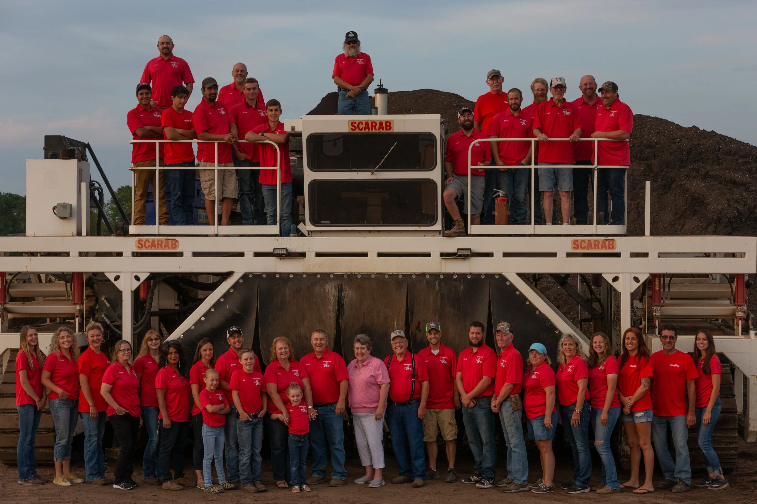 USE-Employee Photo w Scarab 4.jpg