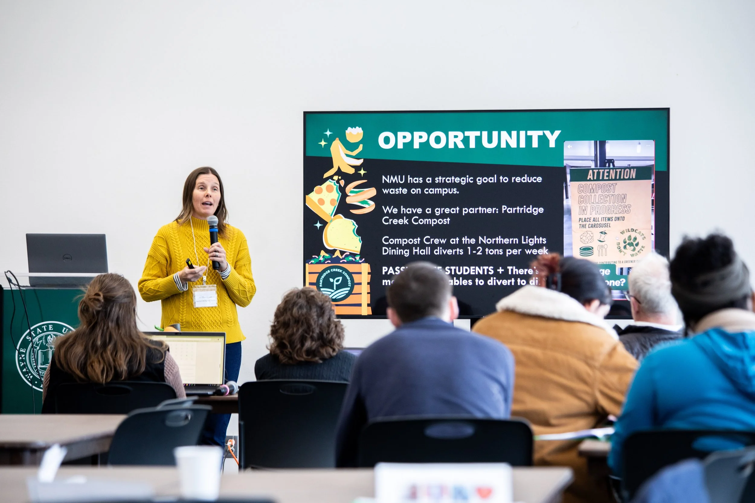 Woman giving presentation with a slide deck showing composting and the word 'Opportunity'