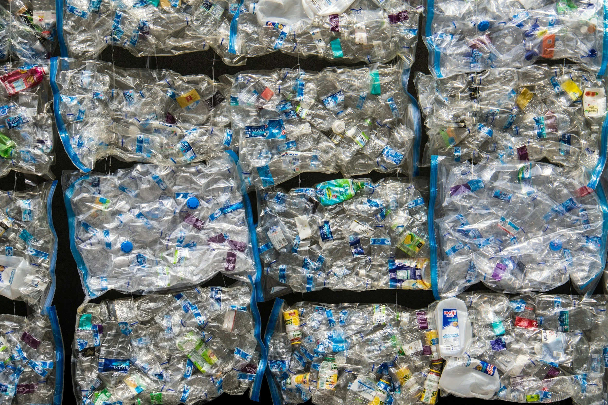 Plastic bales stacked on top of each other.