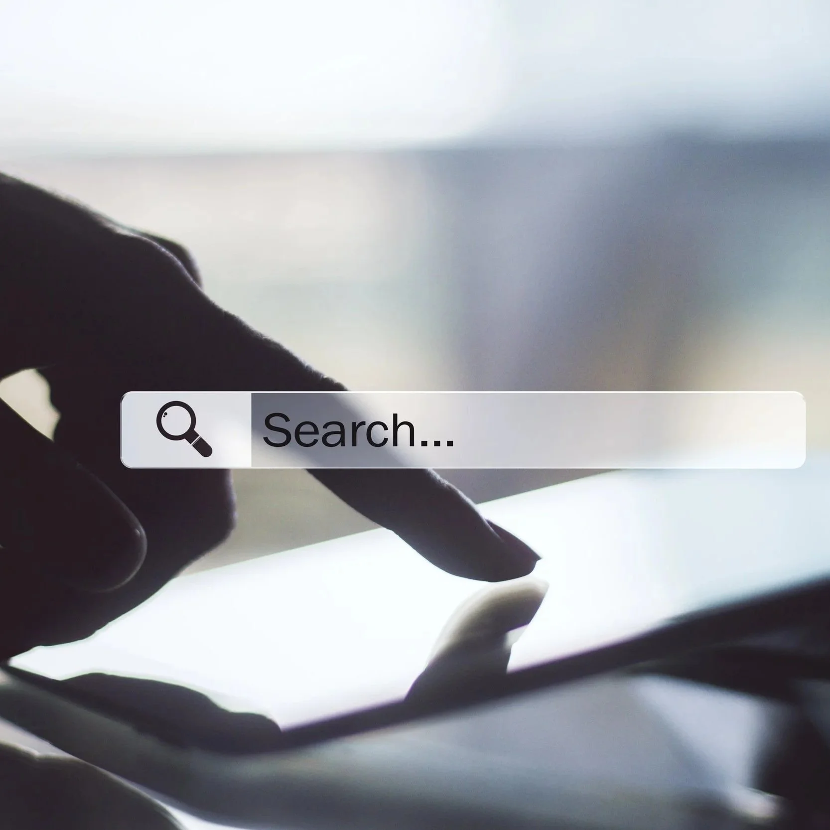 finger searching on phone with search bar