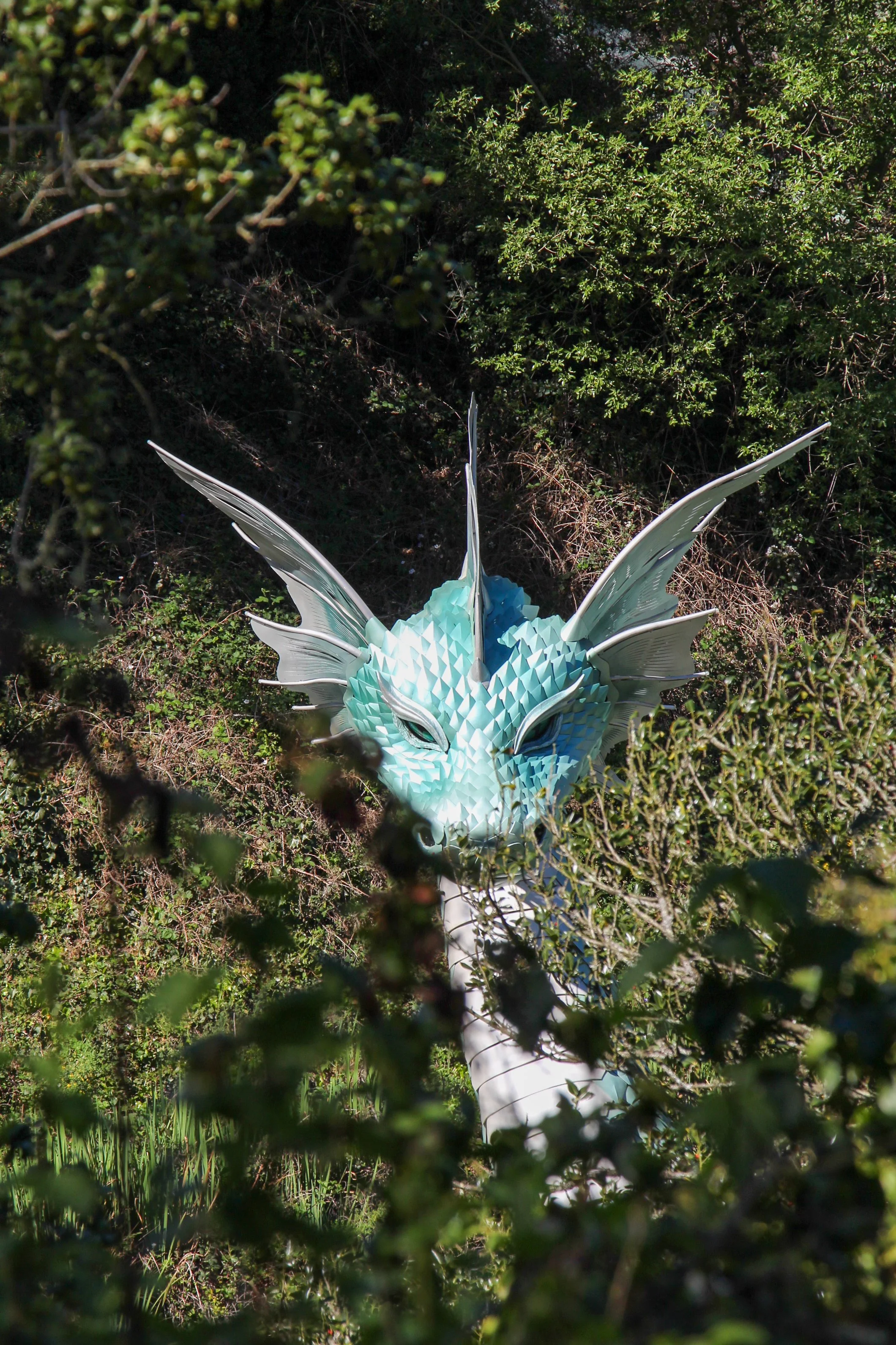  Naga, the sea dragon, emerging from the greenery. 