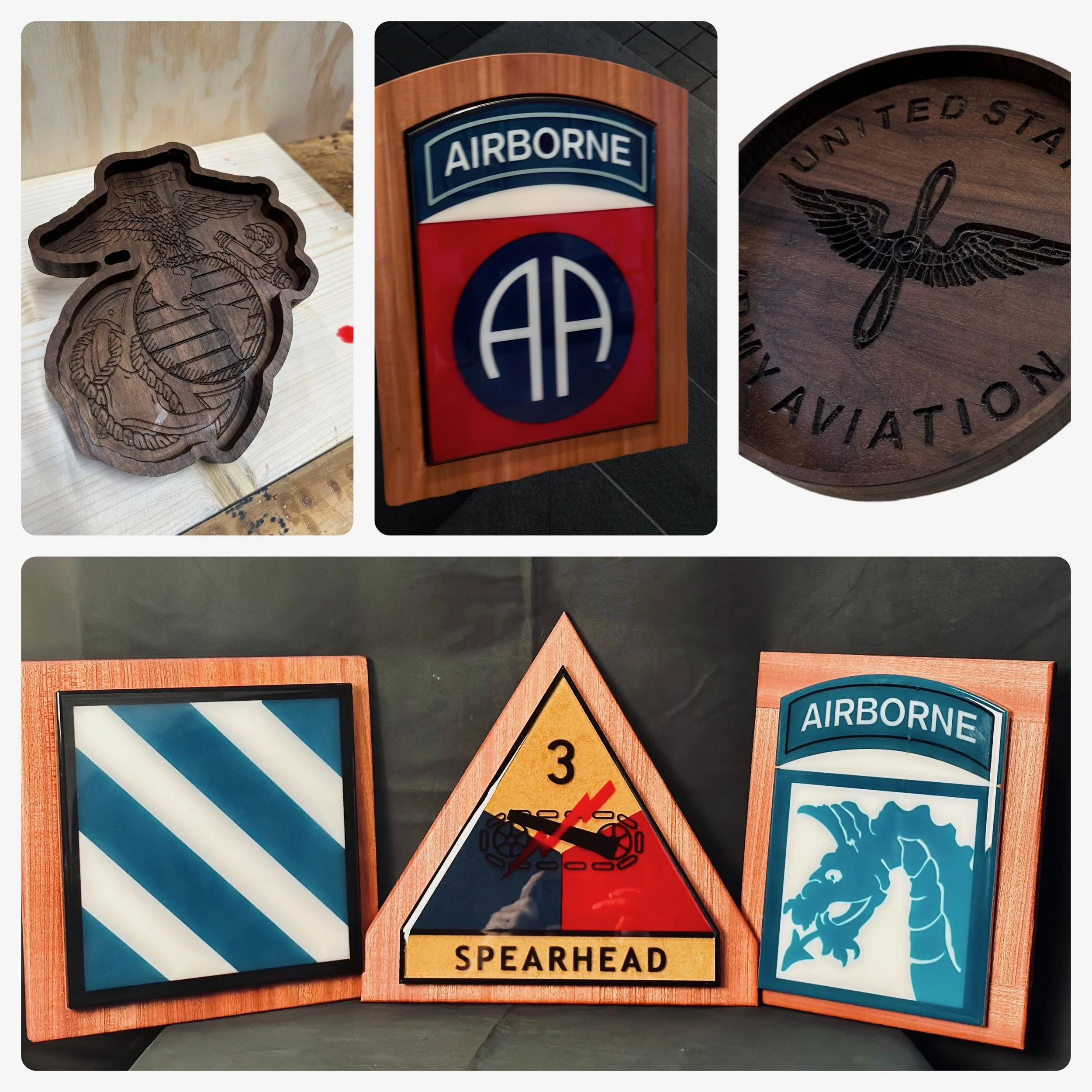Various firefighter signs including a gunmetal emblem with an eagle and axe, a wooden sign with 'AIRBORNE' logo, and a wooden plaque with a winged Staff of Asclepius and the text 'SPEARHEAD'