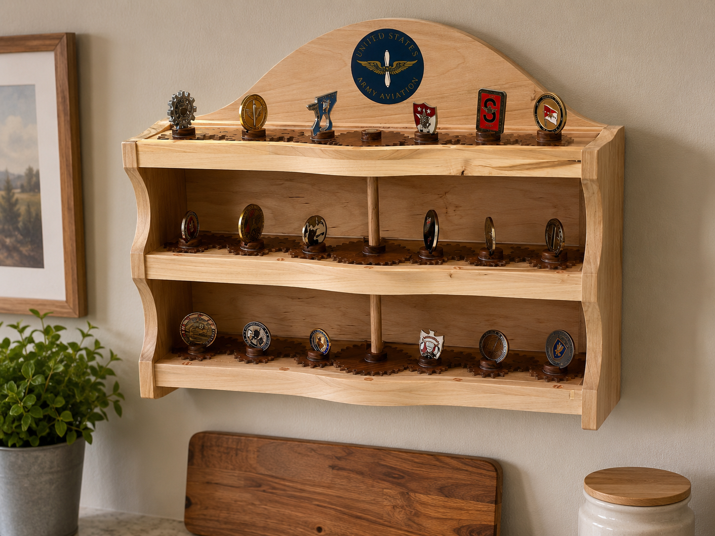 Wooden display shelf with military patches on three shelves, mounted on a wall in a room.