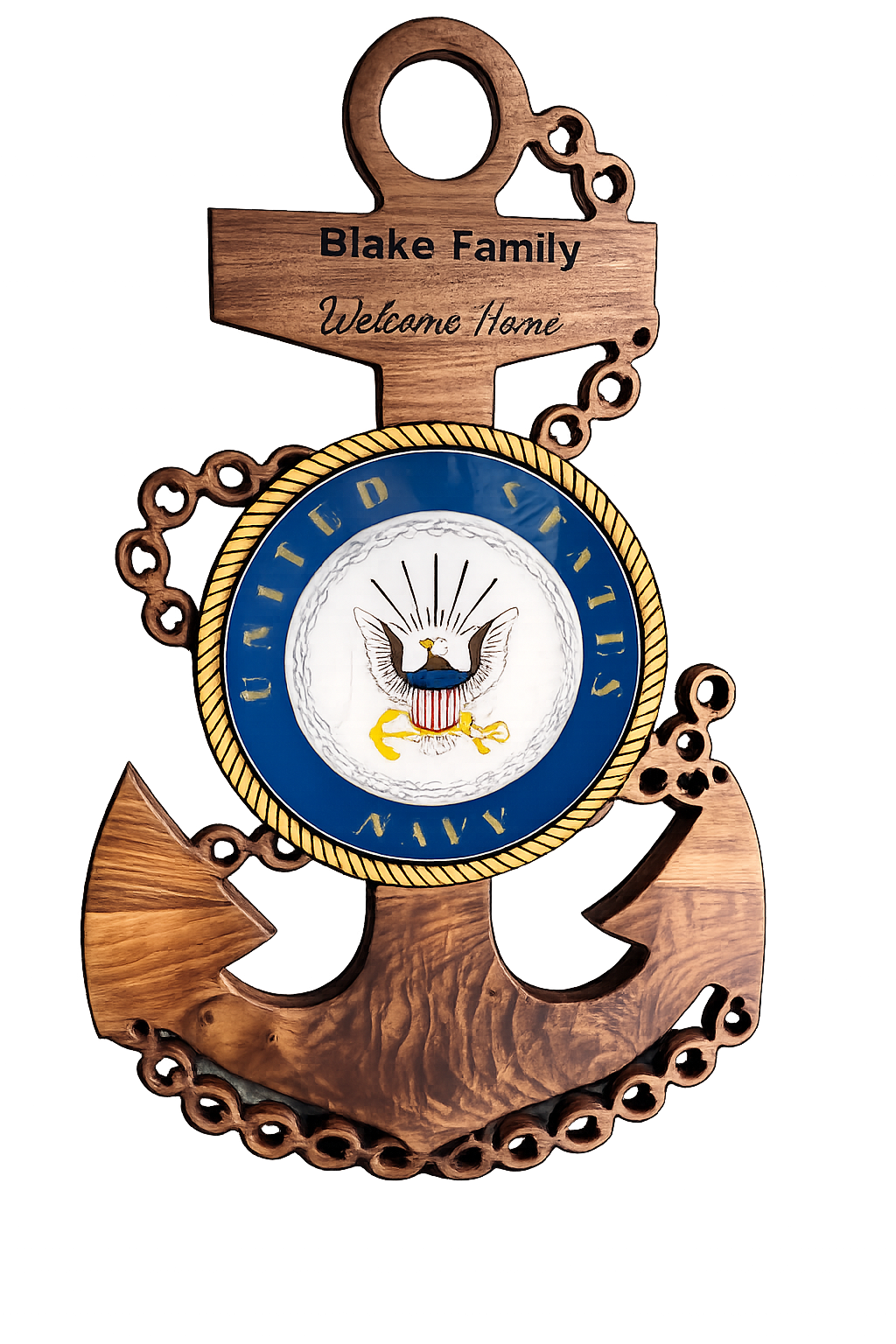 A decorative wall hanging with a wooden anchor and a round emblem featuring an eagle, stars, and stripes, along with a wooden key-shaped plaque that reads "Blake Family Welcome Home."