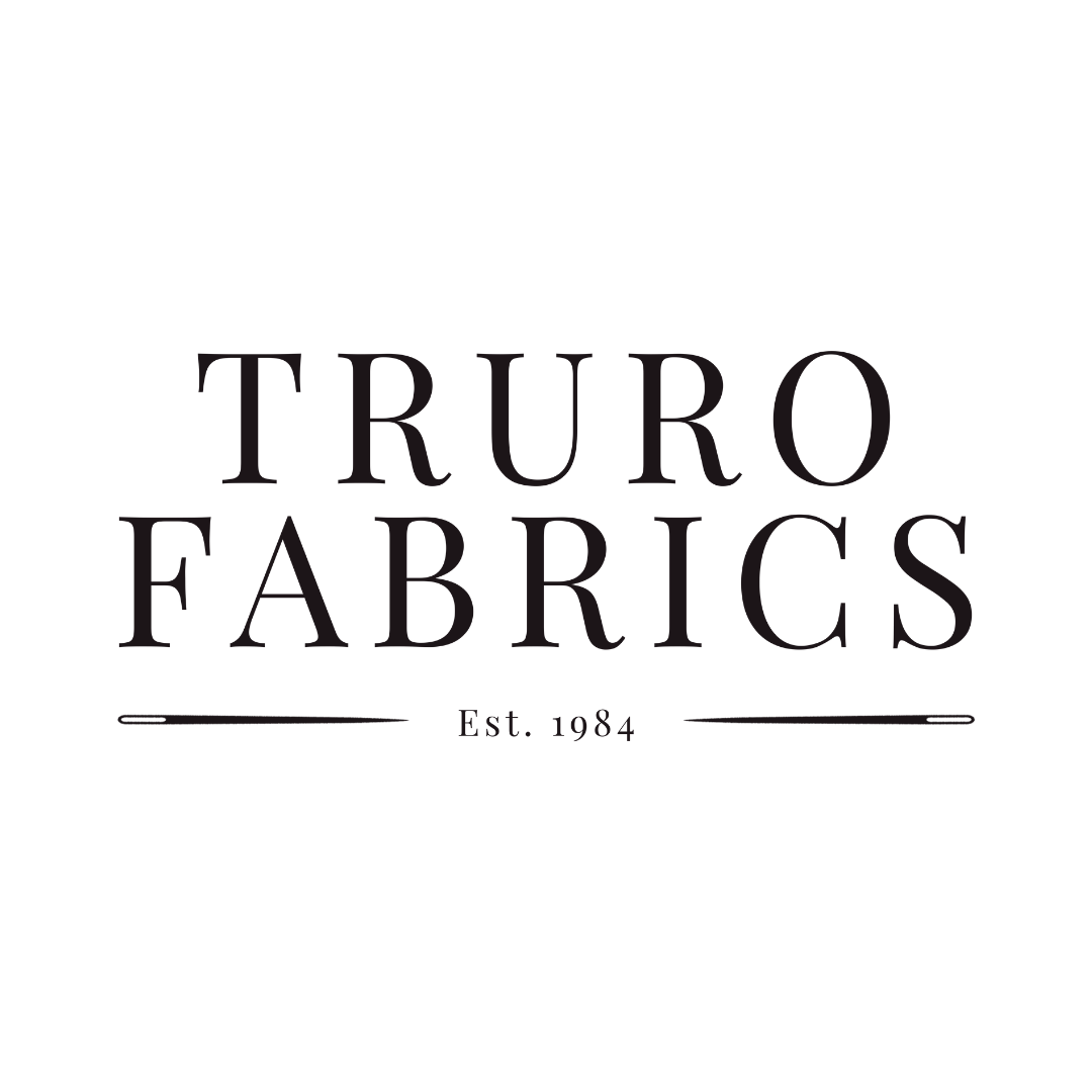 Logo for Truro Fabrics with text 'Est. 1984'.