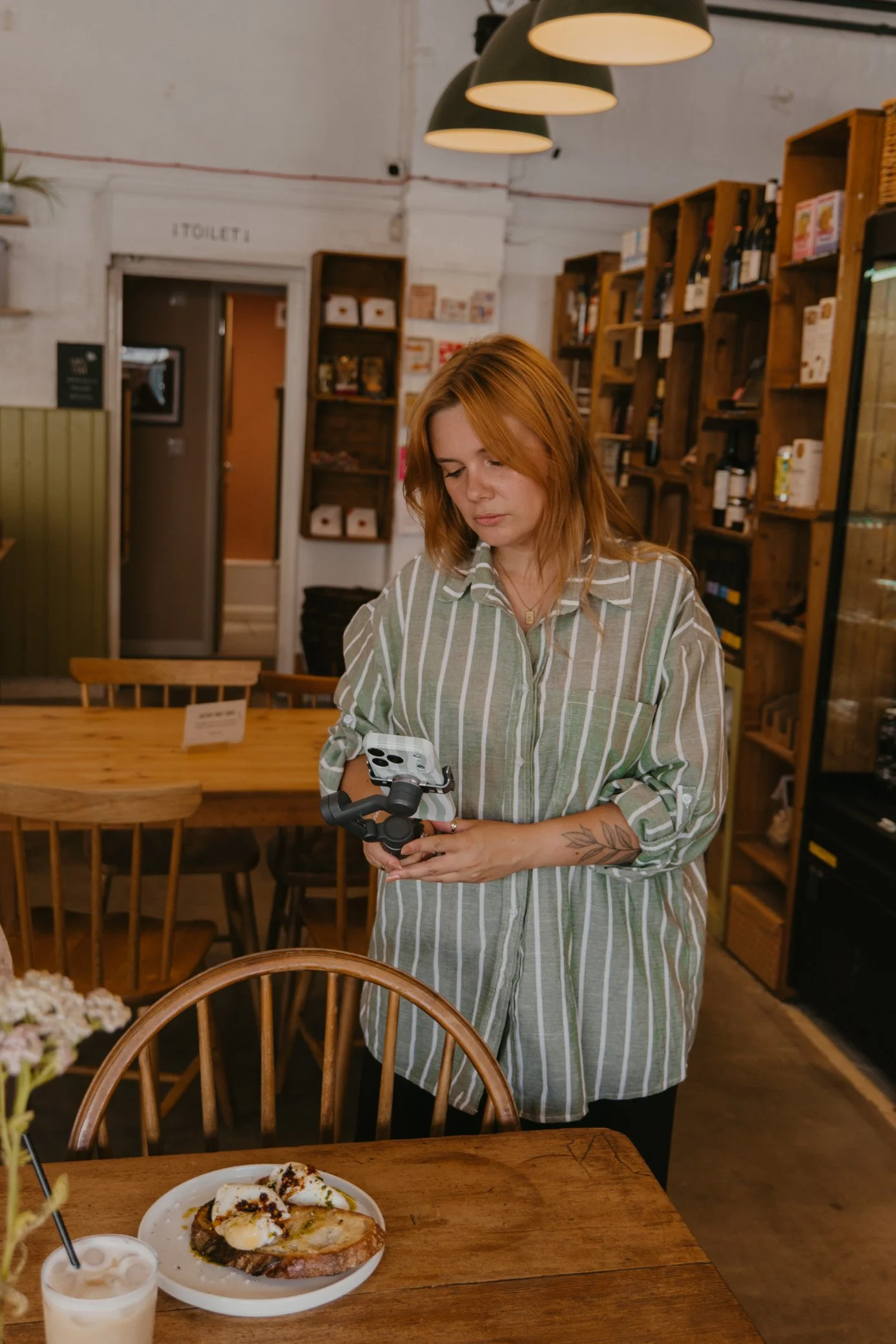 Leah Croft working on social media content for a Cornwall small business