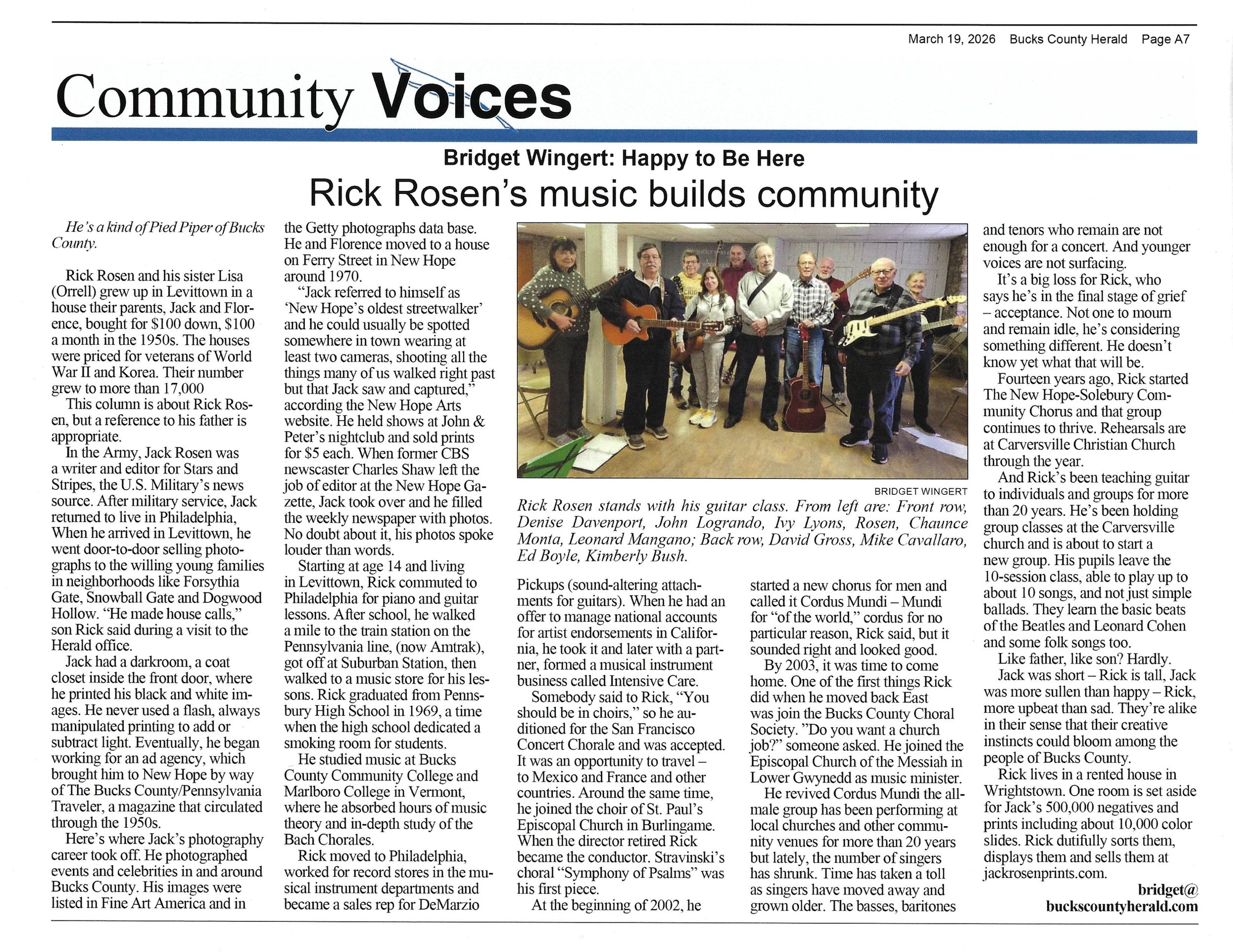 A newspaper page from the Bucks County Herald, March 19, 2026, titled 'Community Voices,' featuring an article about Rick Rosen's music building community, with a group photograph of musicians holding guitars and standing together indoors.