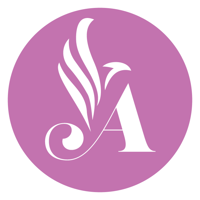 A white decorative letter 'A' with floral design elements on a purple circular background.