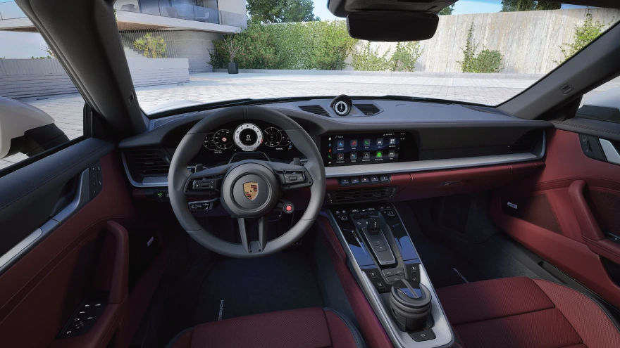 A view of a 2026 Porsche 911 Carrera Cabriolet's dashboard.