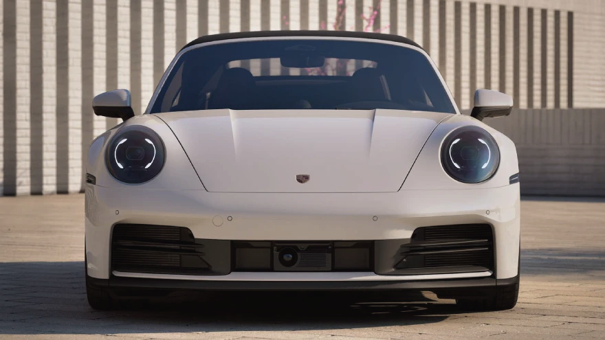 A front view of a 2026 Porsche 911 Carrera Cabriolet.