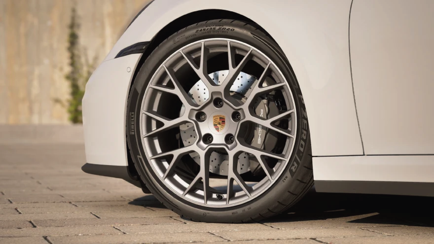 A view of a 2026 Porsche 911 Carrera Cabriolet's tire.