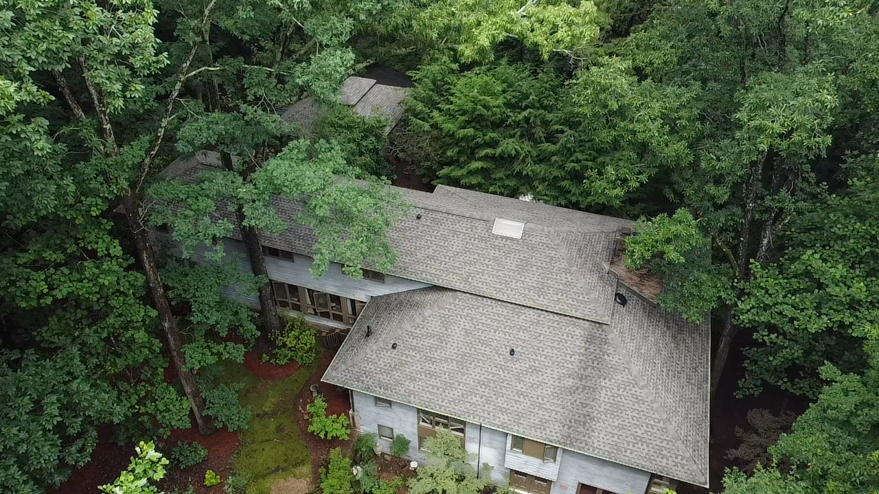 Completed roof replacement on a home, done by A-Total Roofing and Exteriors