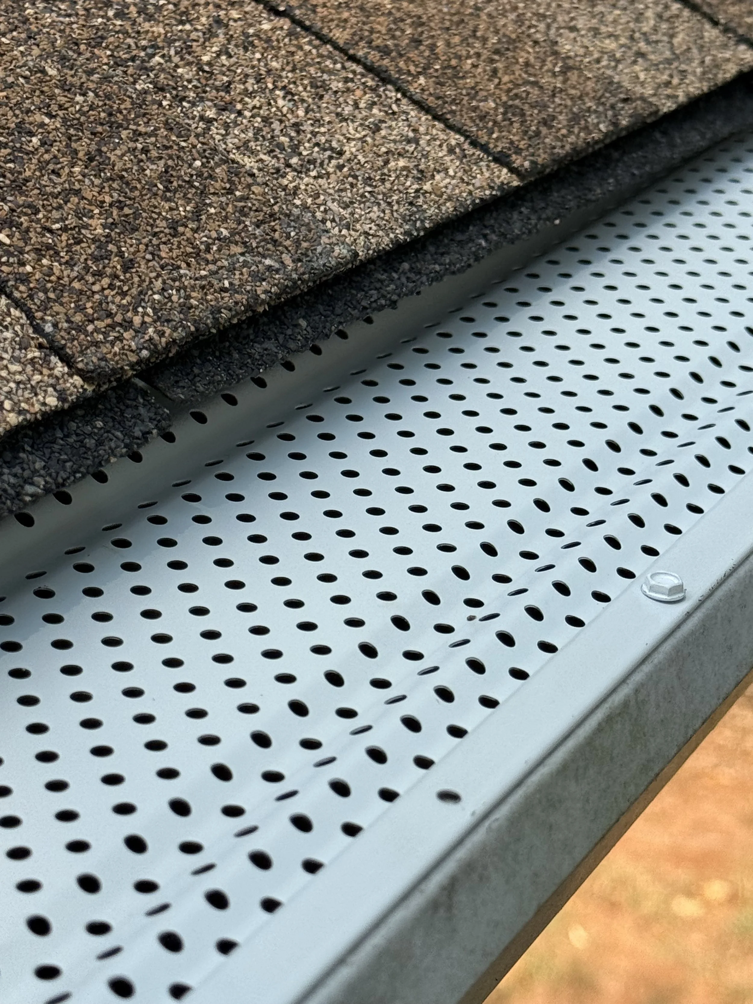 New seamless gutters guards installed on a home in Metro Atlanta