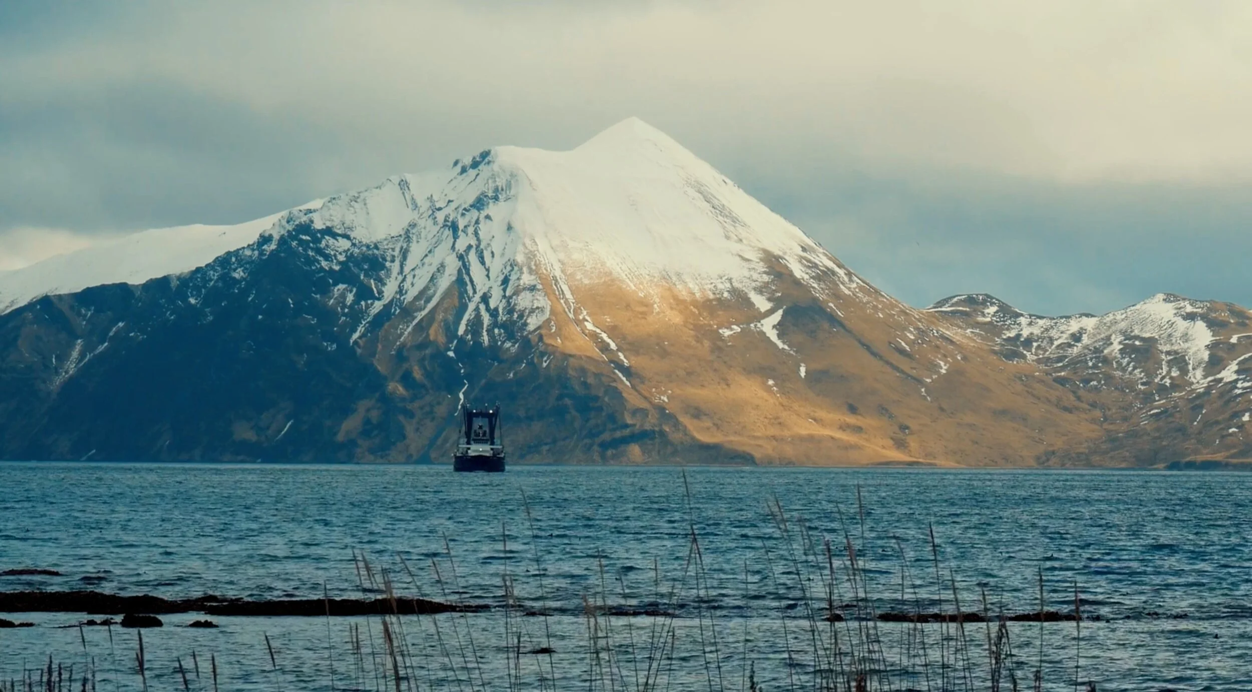 Delta Western boat and mountains