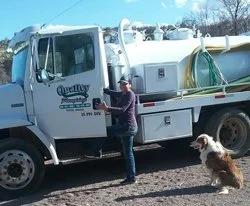 fasano-win-chancy-thomas-with-her-first-pump-truck-and-her-dog-red-250.jpg