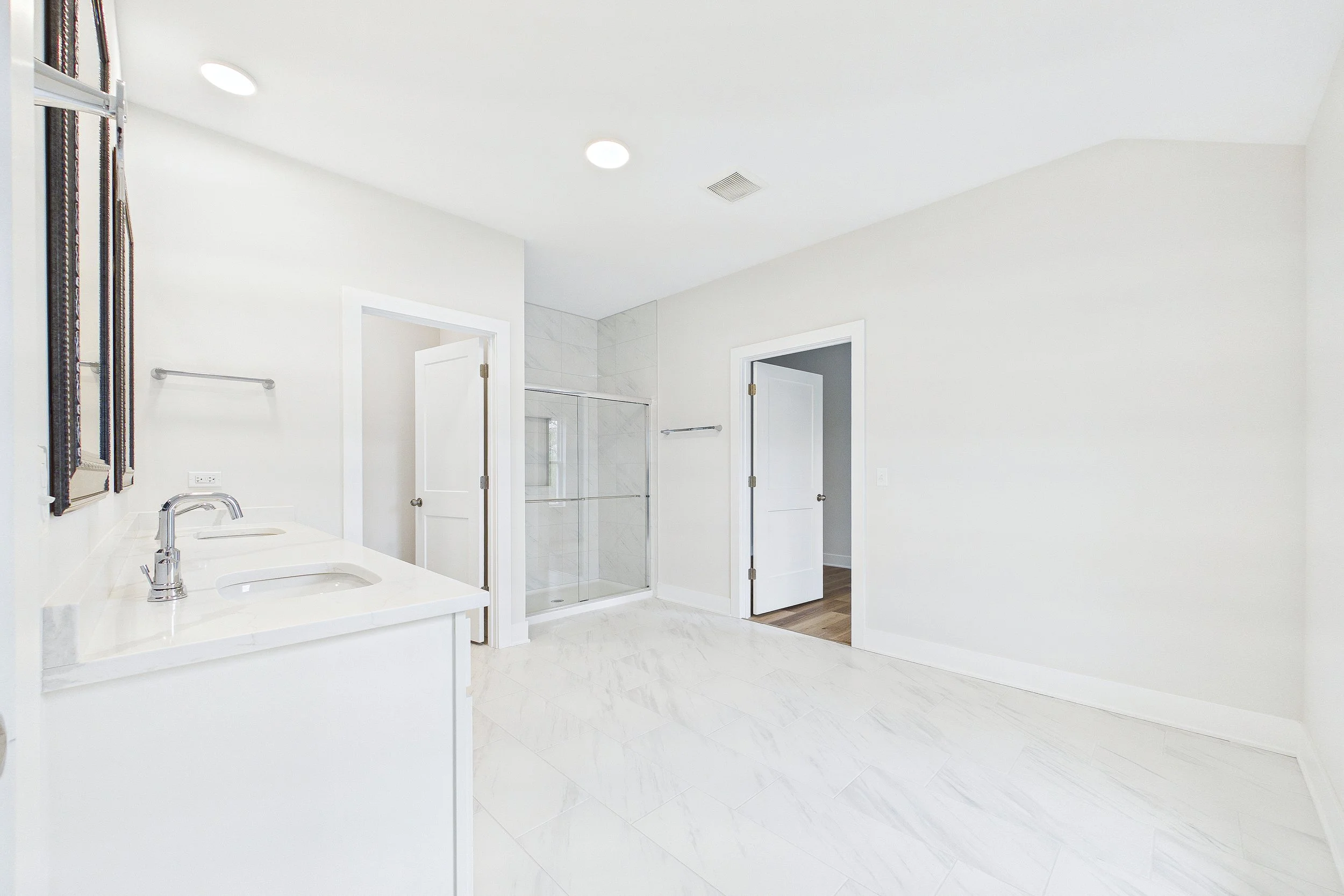 35-Two Story Primary Bathroom.jpg