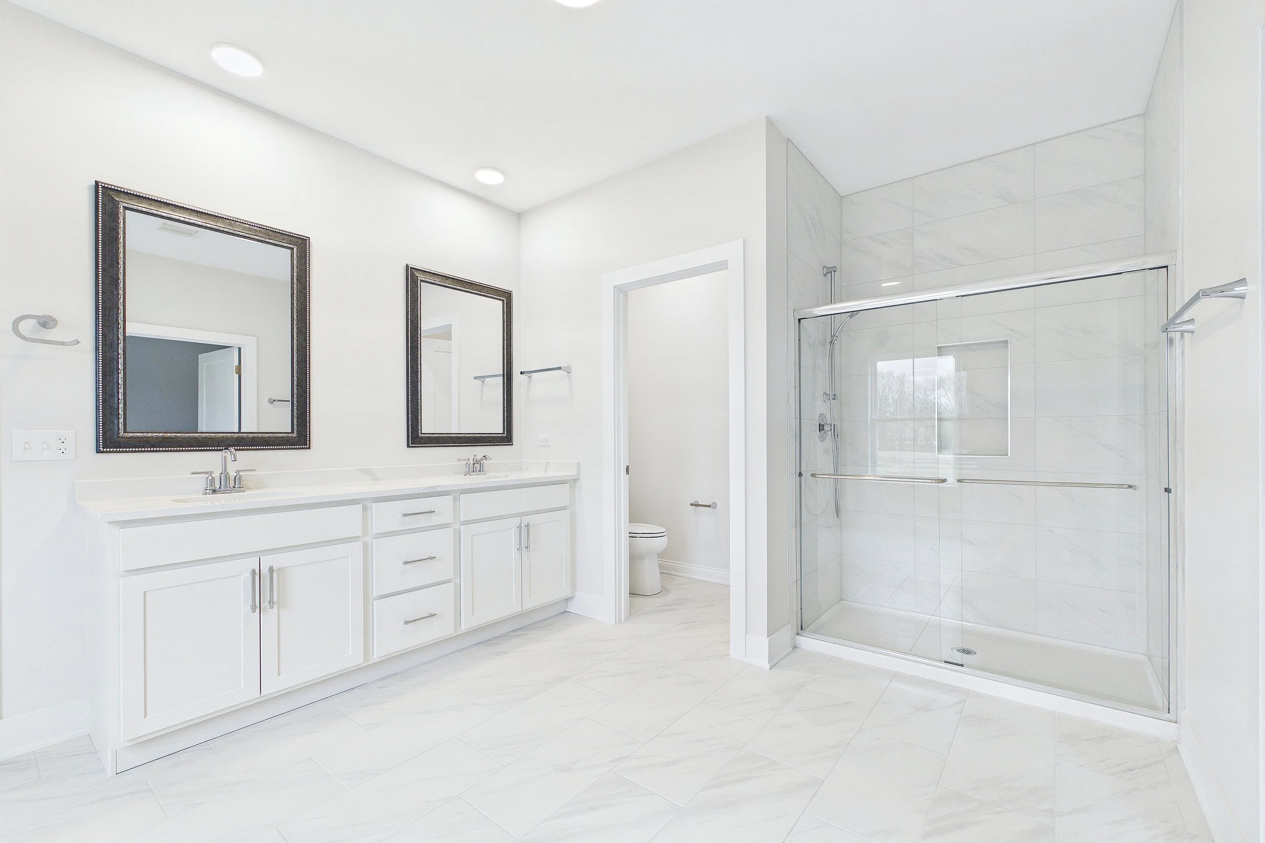 34-Two Story Primary Bathroom.jpg