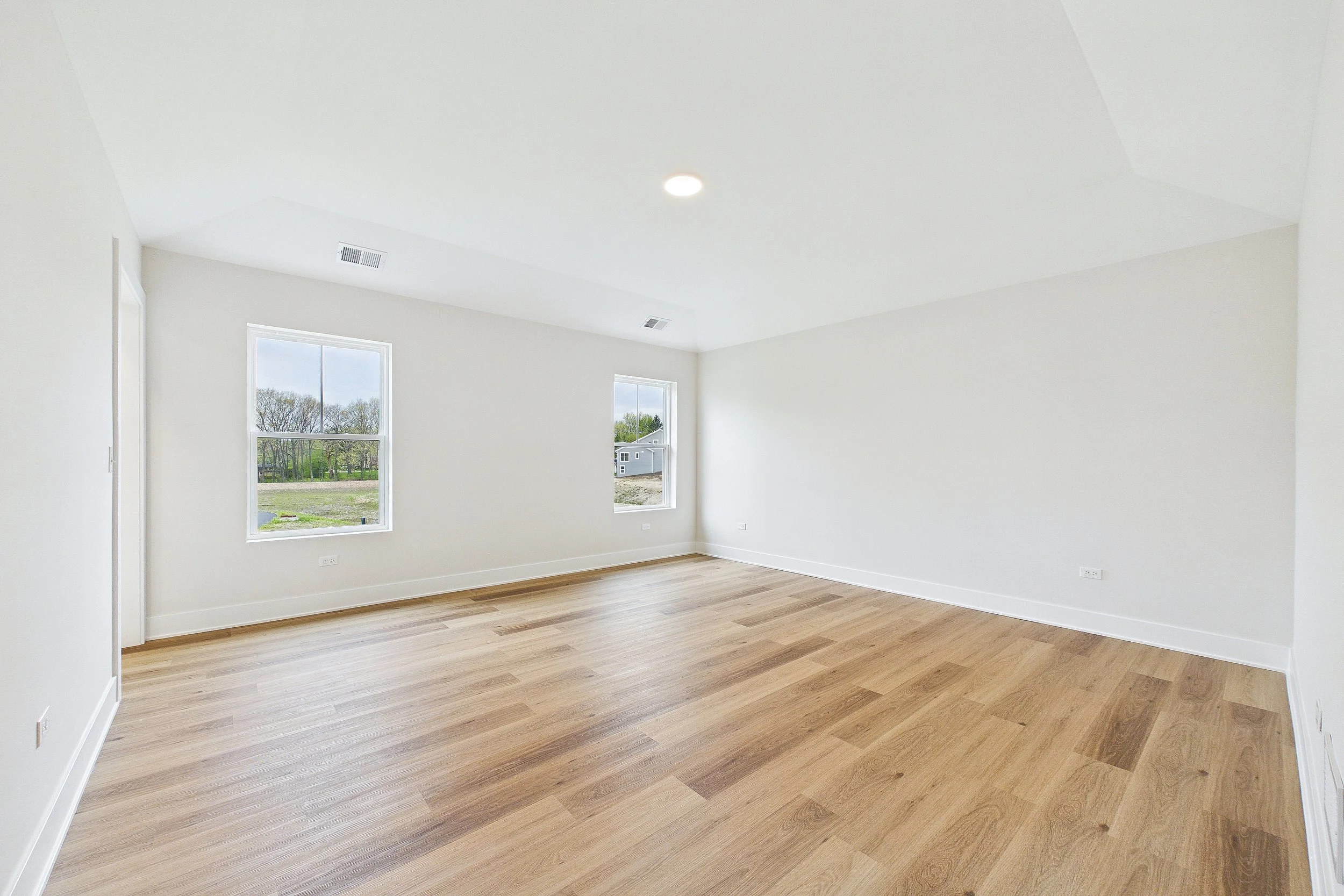 32-Two Story Primary Bedroom.jpg