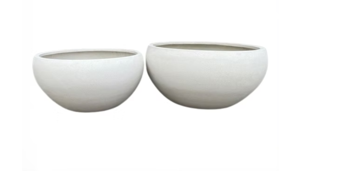 Two large white ceramic planters, empty, side by side.