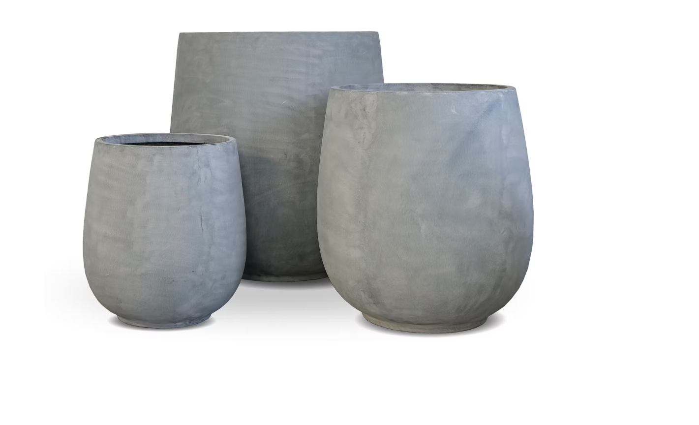 Three large, gray, rounded flower pots with a smooth, matte finish, arranged against a plain white background.