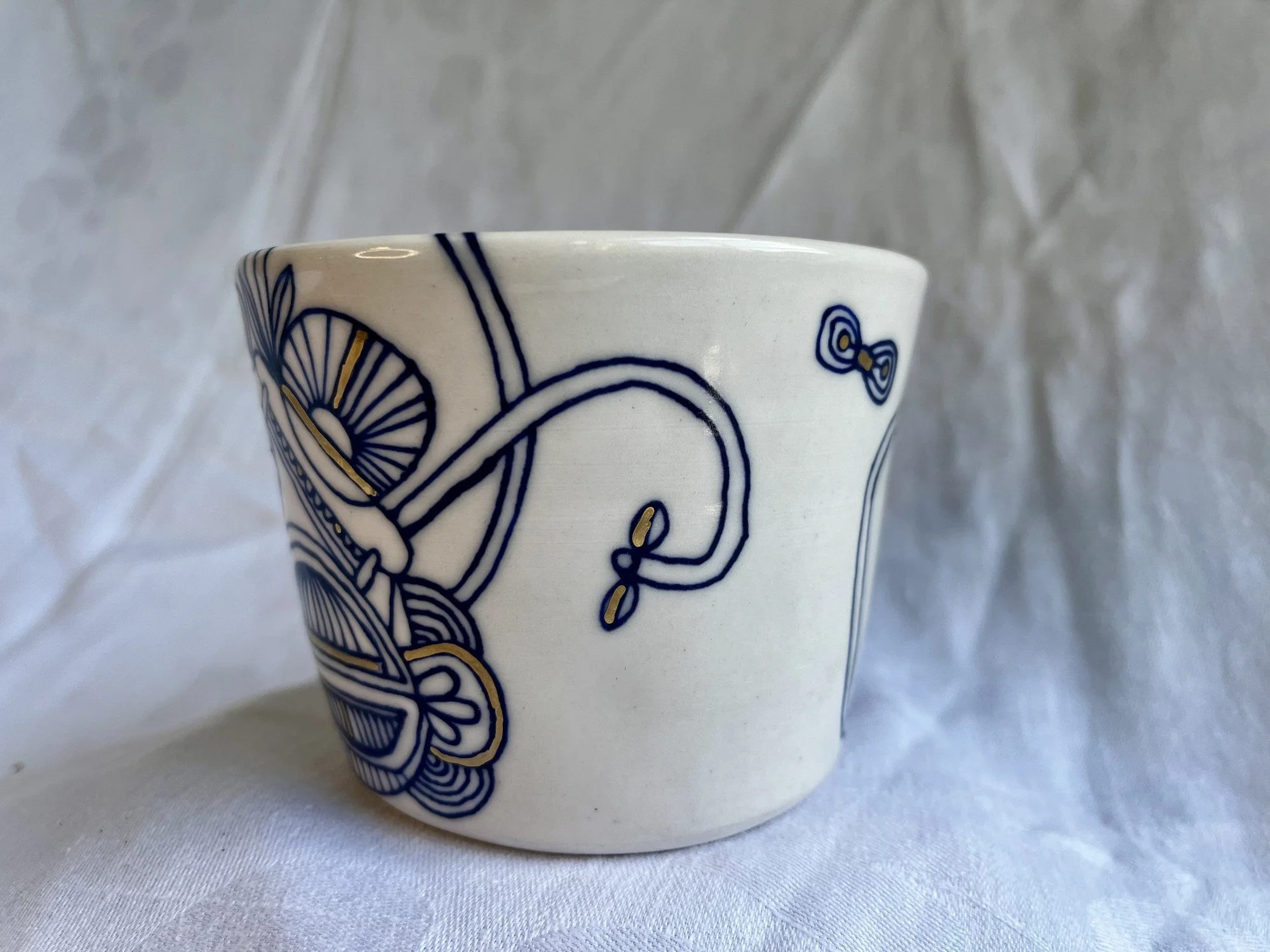 Wheel-thrown porcelain tumbler No. 002, hand-painted in Naples, Florida