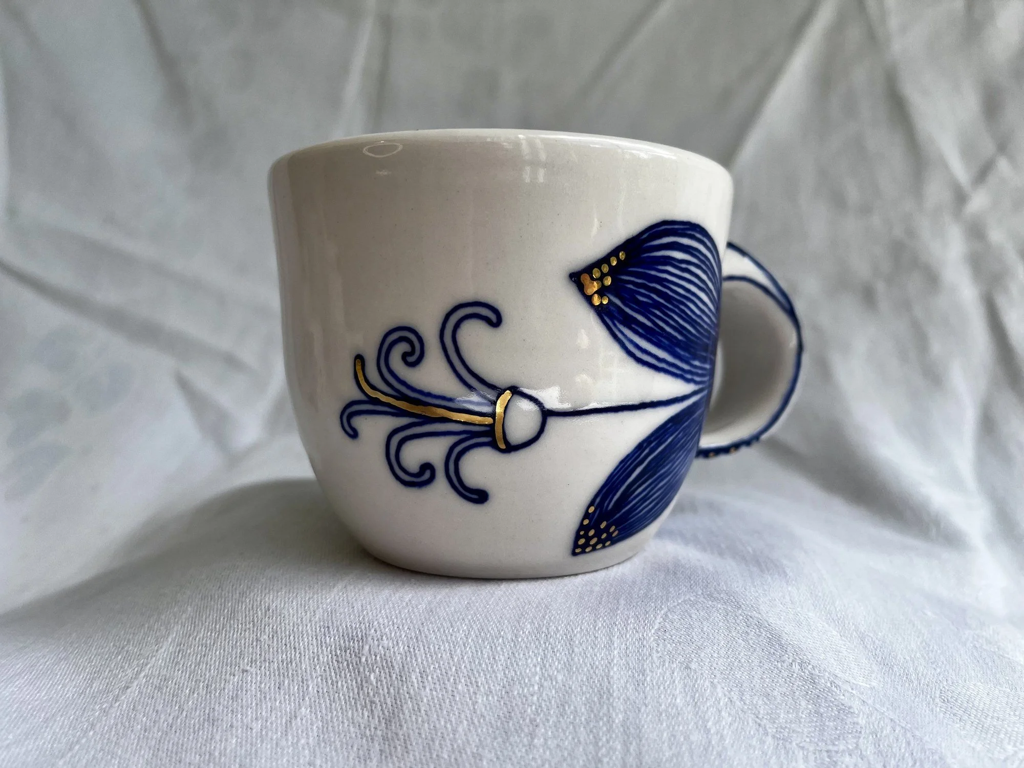 Cobalt blue line work and gold luster detail on handmade porcelain mug No. 029