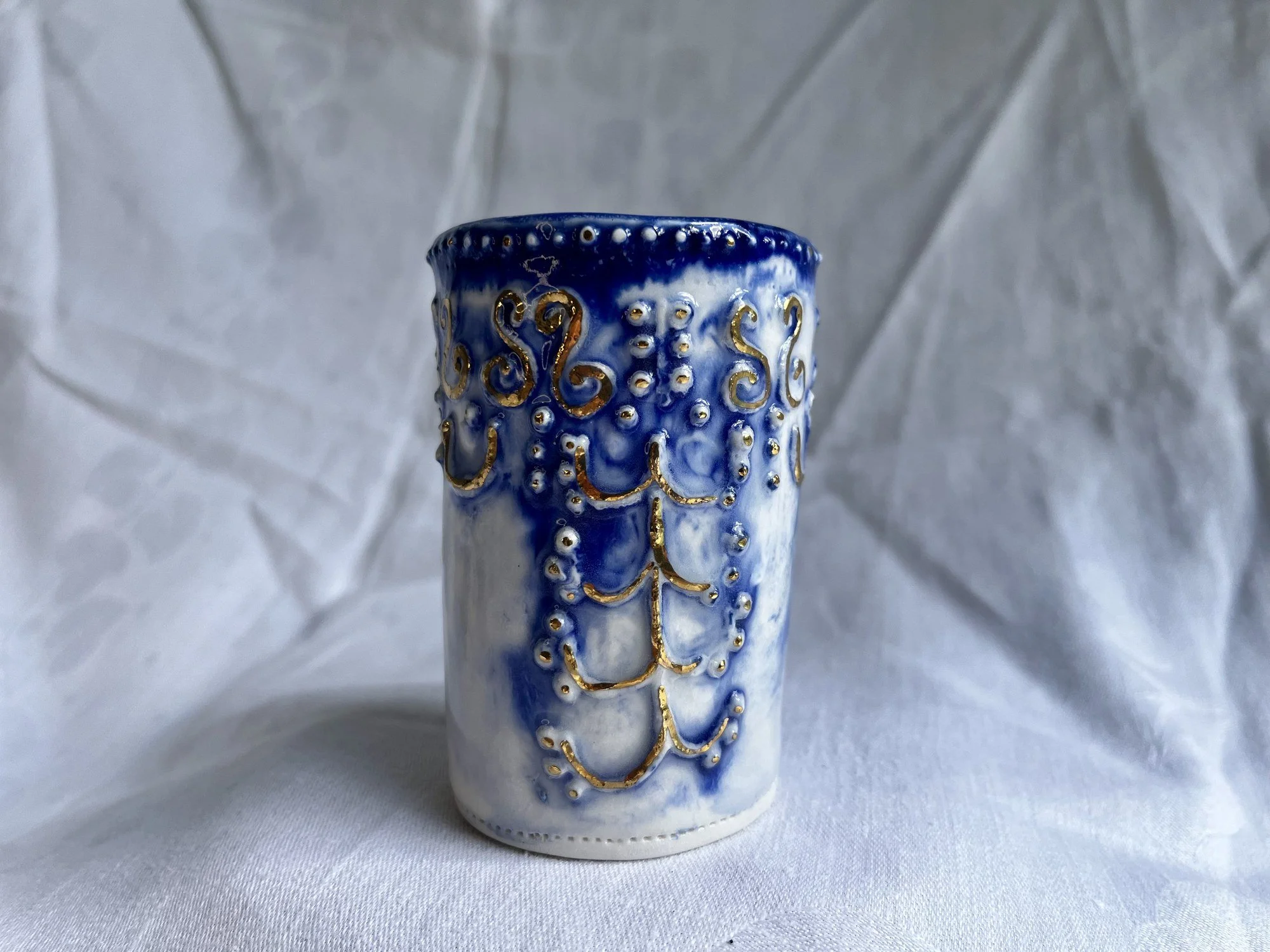 Raised texture and gold luster detail on handmade porcelain bud vase No. 003