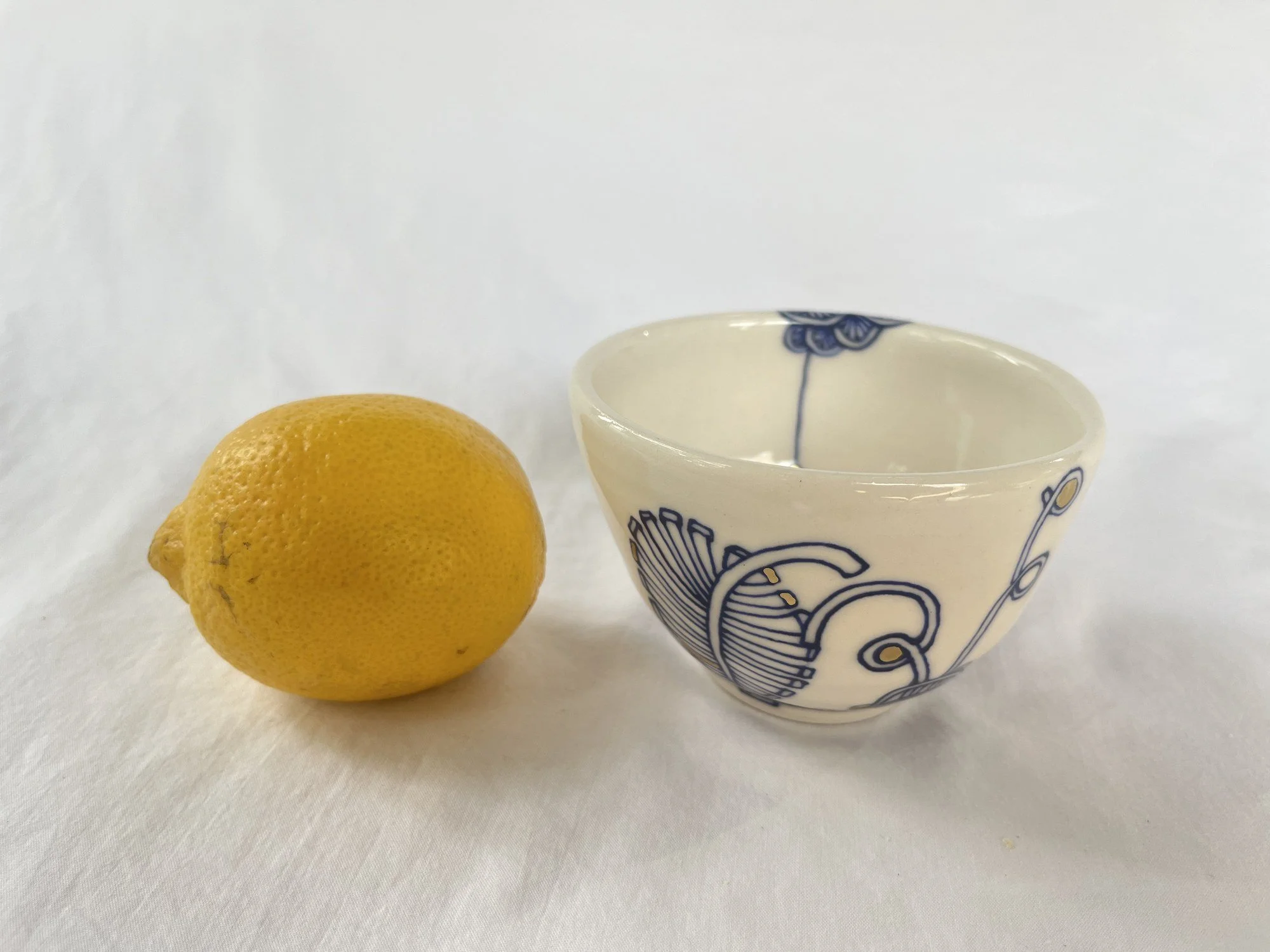 Cobalt blue line work and gold luster detail on handmade porcelain bowl No. 001