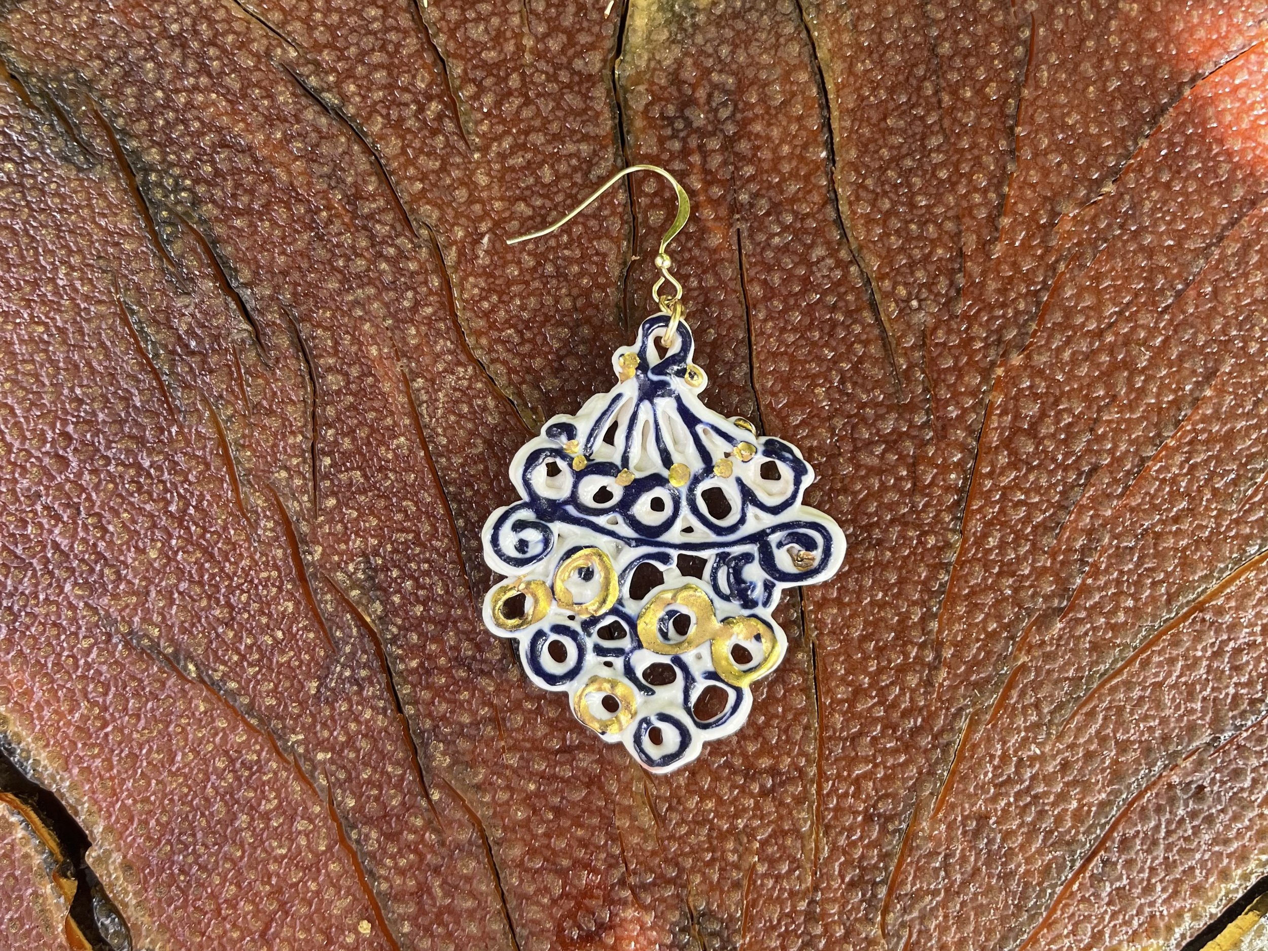 Hand-crafted porcelain earring No. 001 with cobalt blue line work and gold luster detail