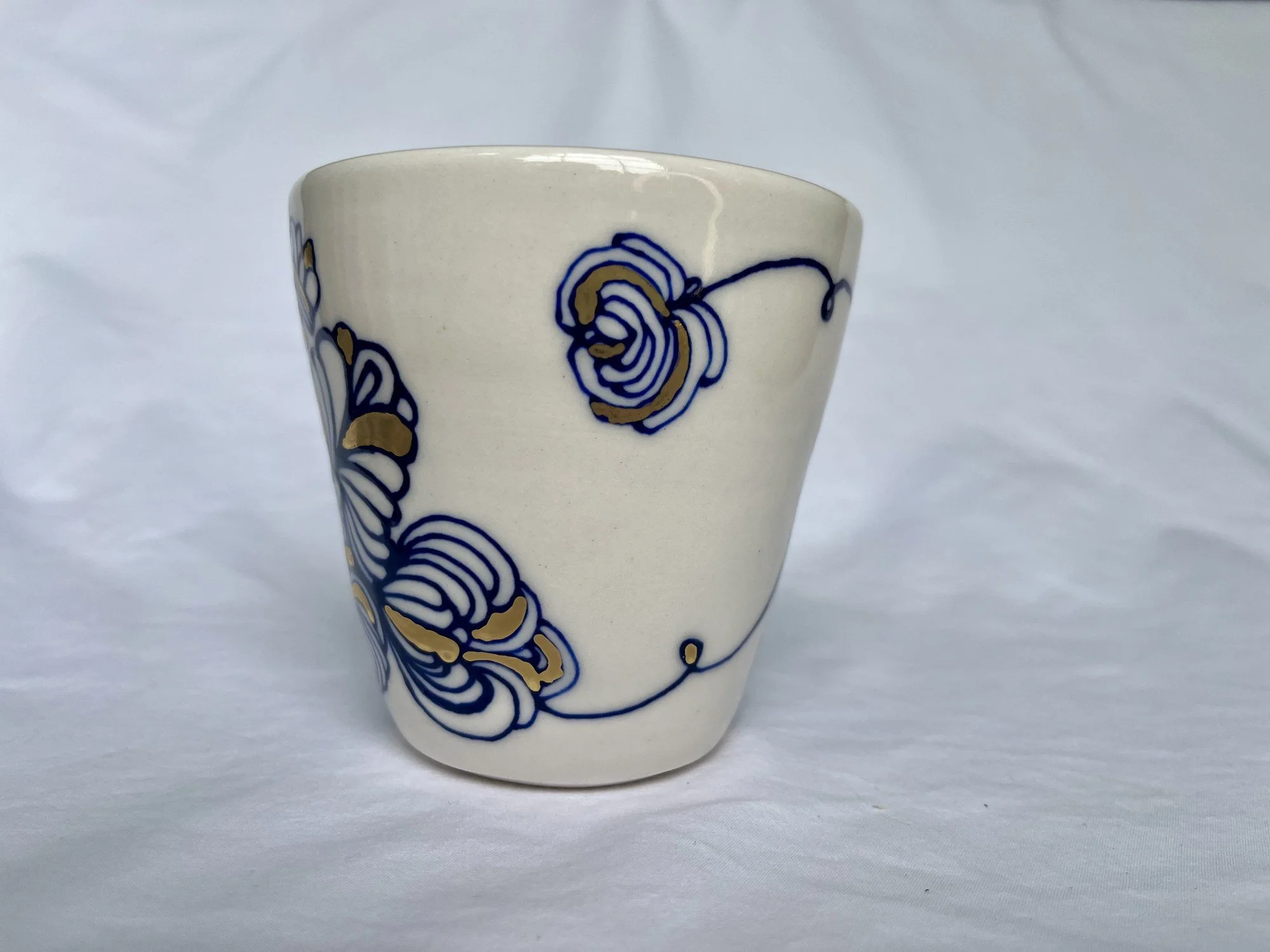 Cobalt blue line work and gold luster detail on handmade porcelain mug No. 009