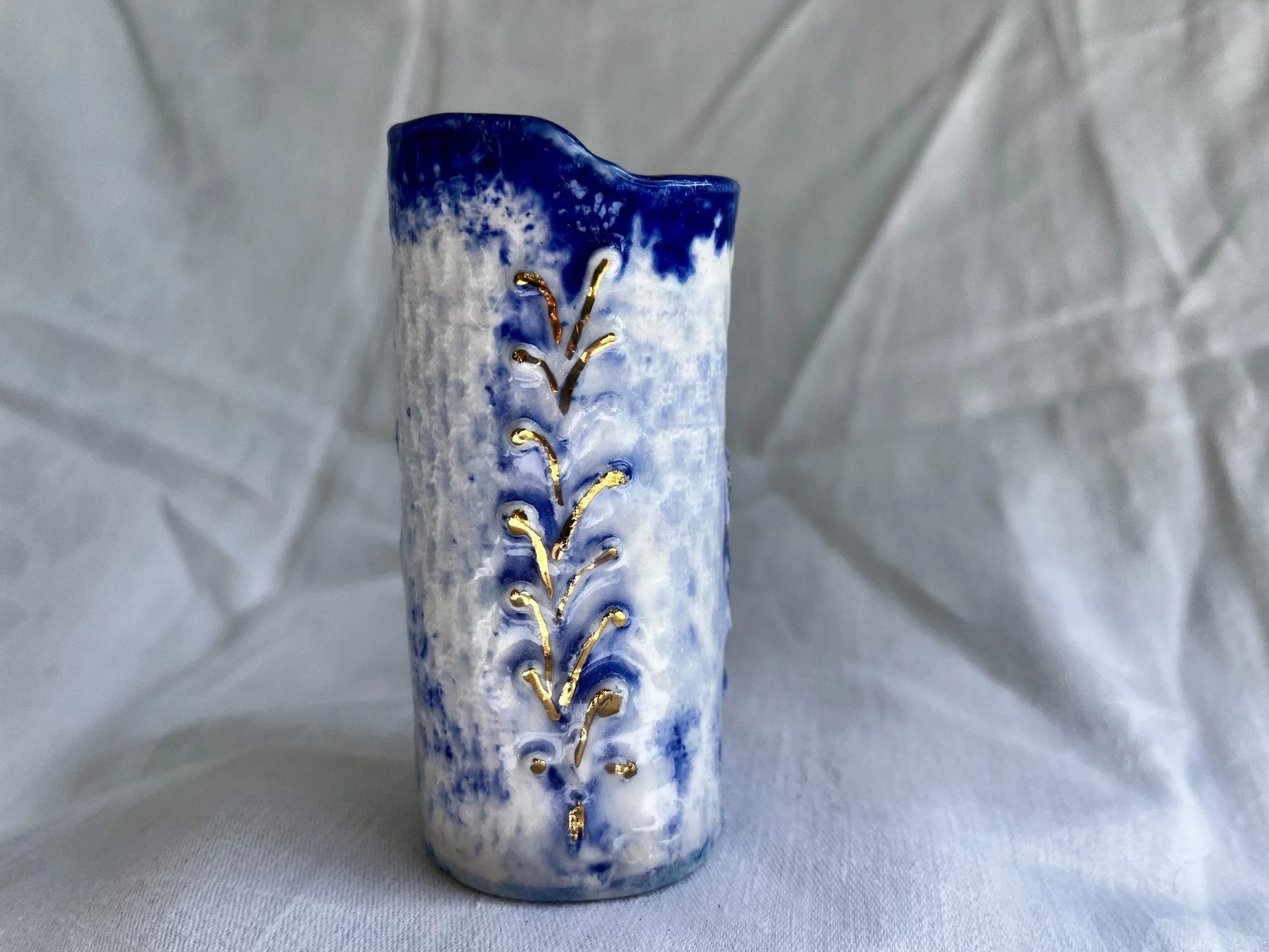 Raised texture and gold luster detail on handmade porcelain bud vase No. 002