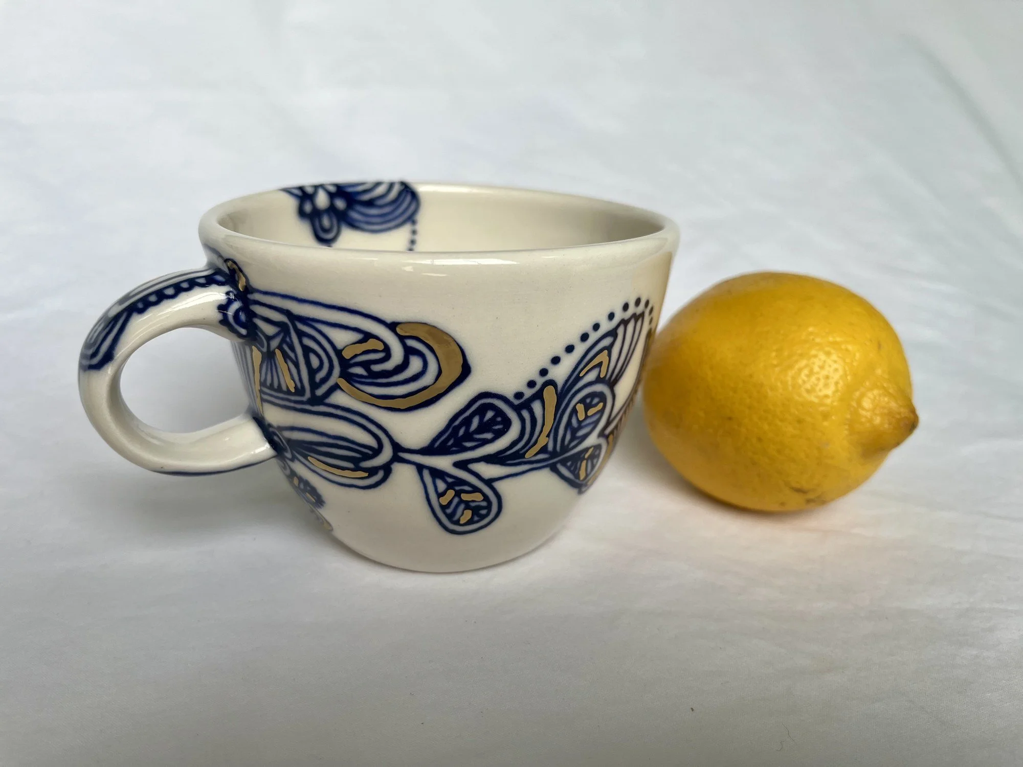 Hand-painted cobalt blue and gold luster porcelain mug No. 014 by Cypress Knees Ceramics