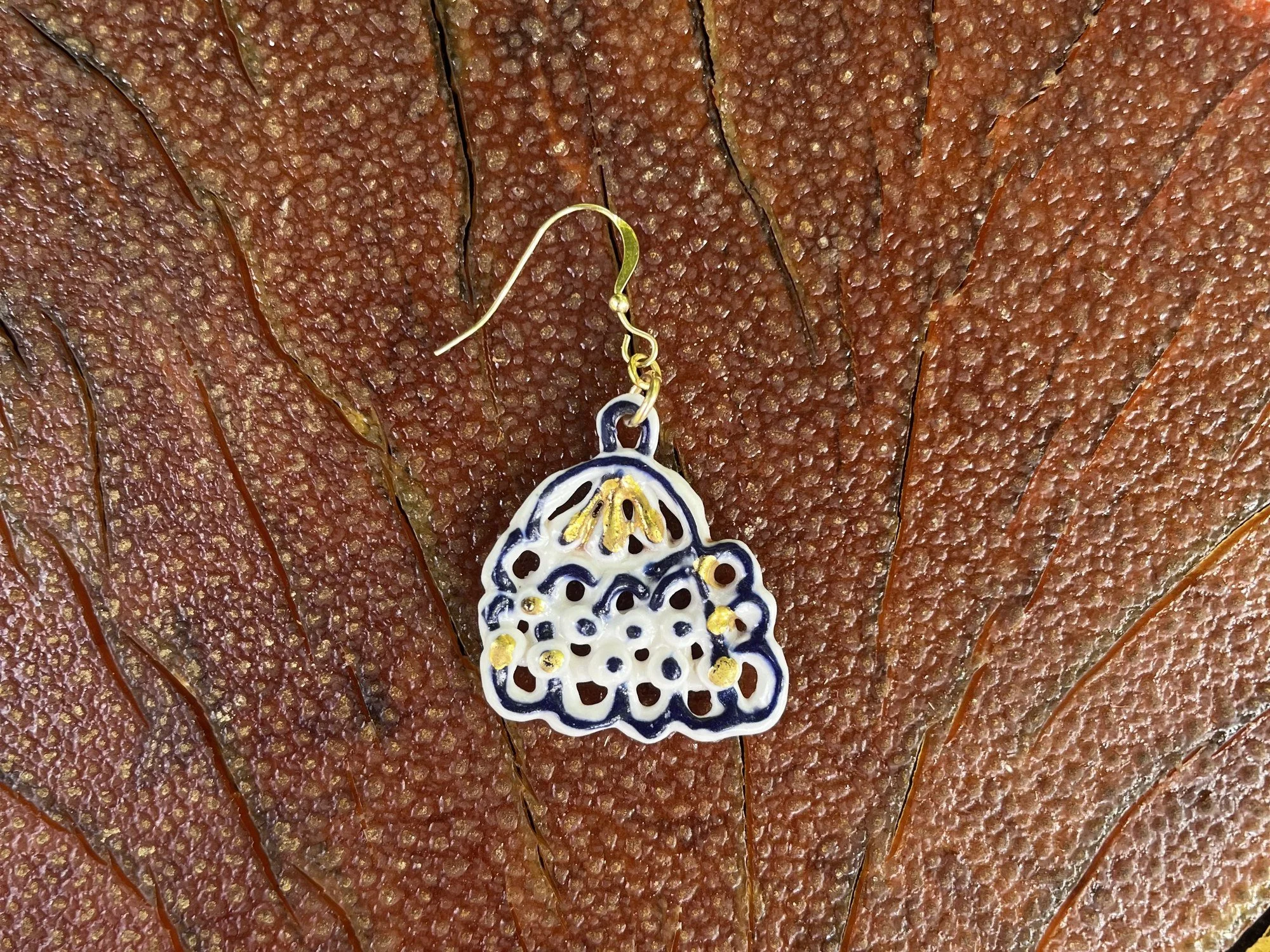 Hand-crafted porcelain earring No. 003 with cobalt blue line work and gold luster detail