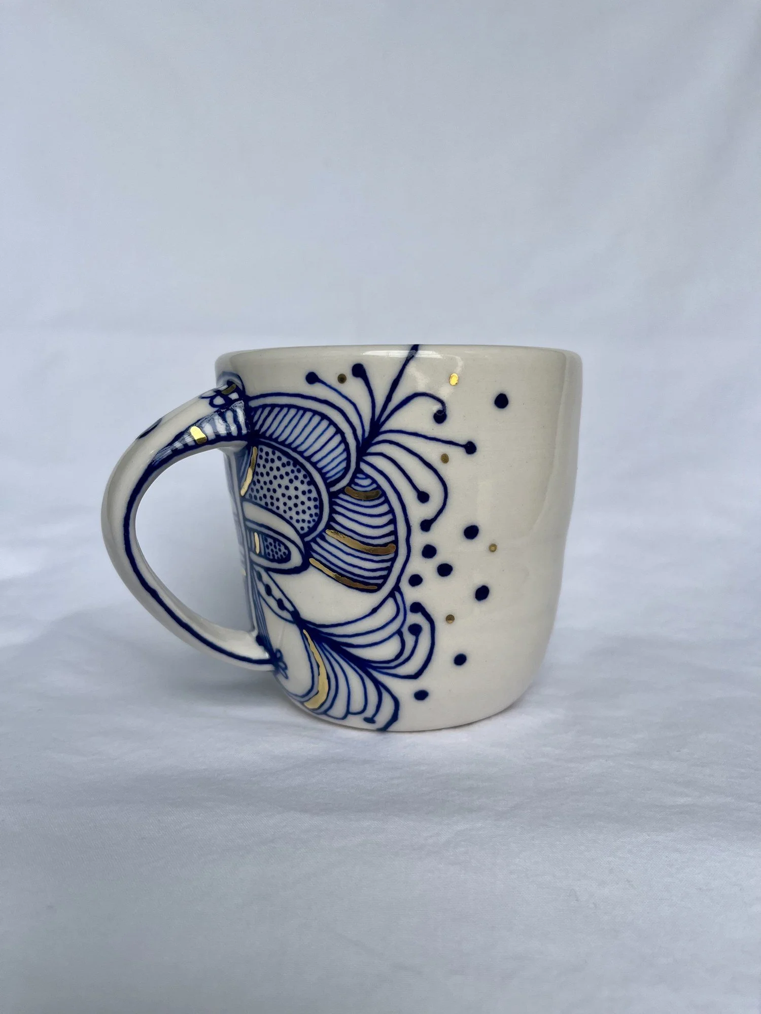 Cobalt blue line work and gold luster detail on handmade porcelain mug No. 002