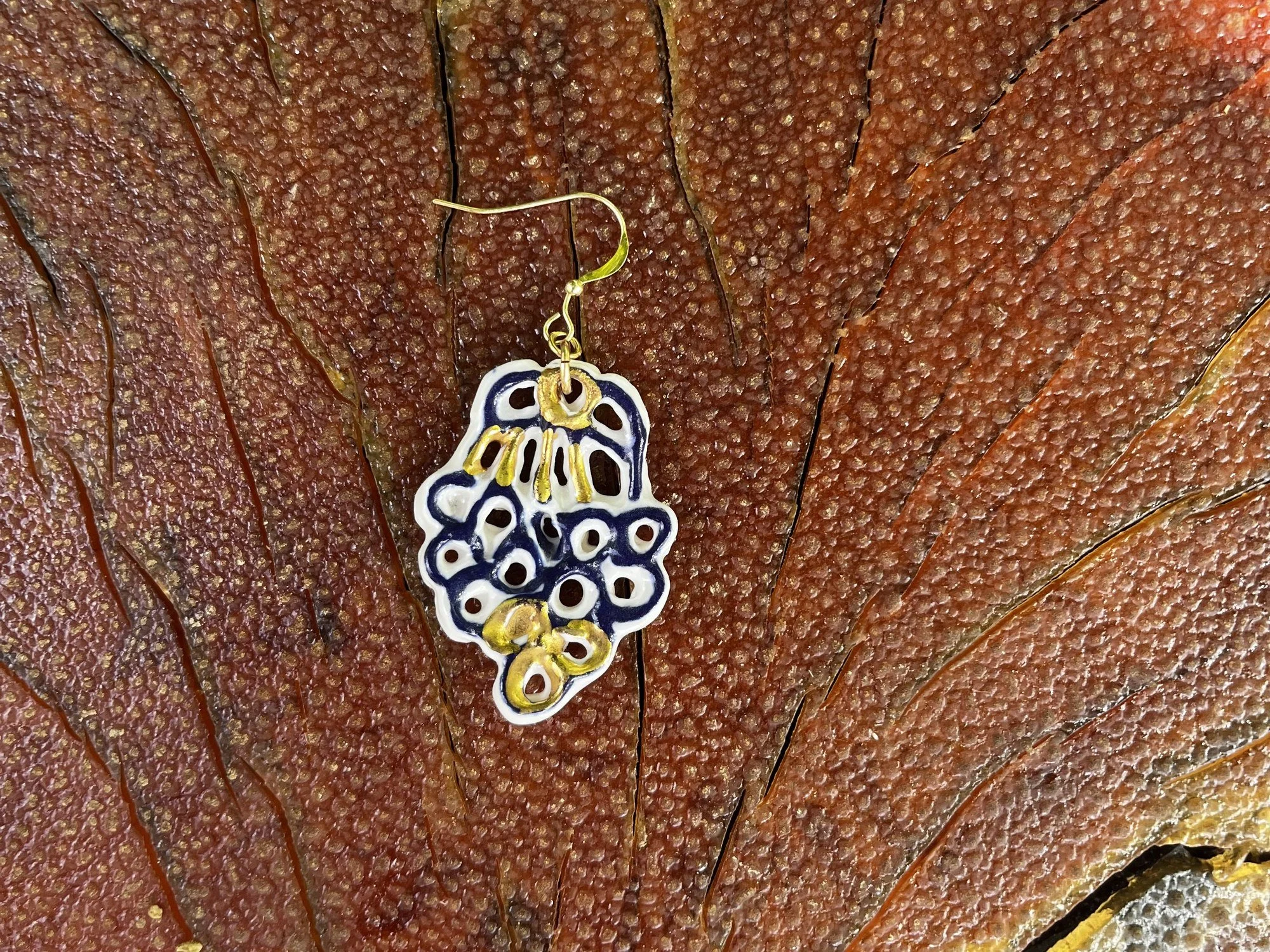 Hand-crafted porcelain earring No. 008 with cobalt blue line work and gold luster detail