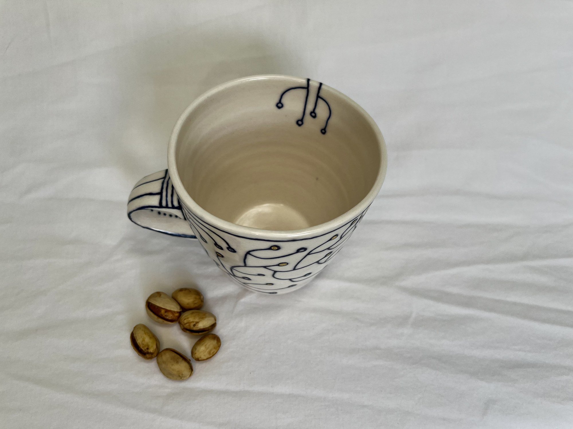 Wheel-thrown porcelain mug No. 023, hand-painted in Naples, Florida