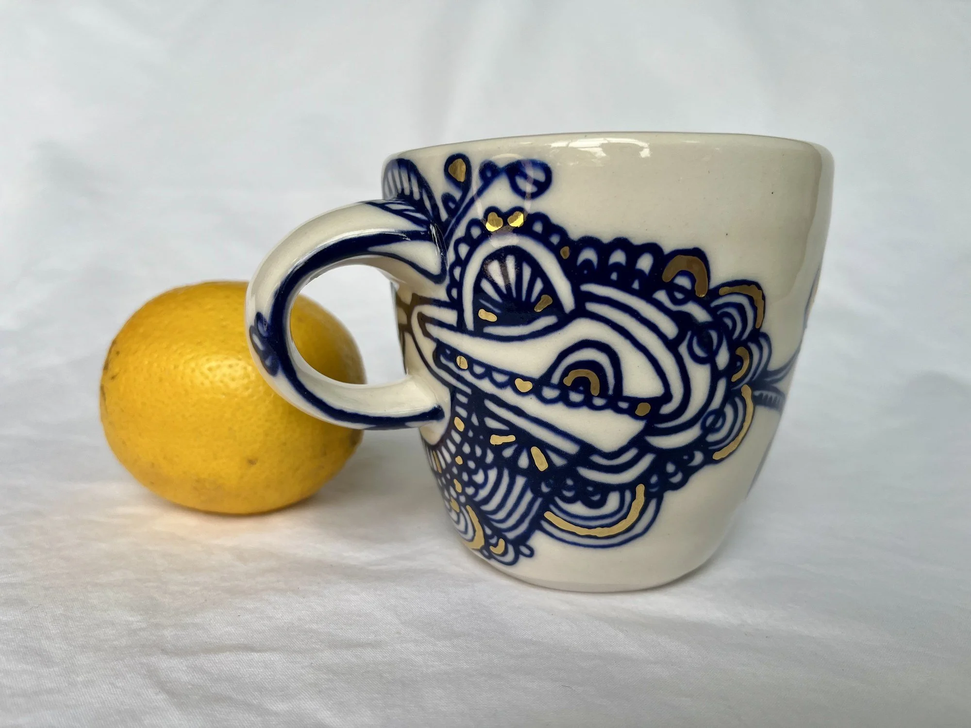Cobalt blue line work and gold luster detail on handmade porcelain mug No. 007