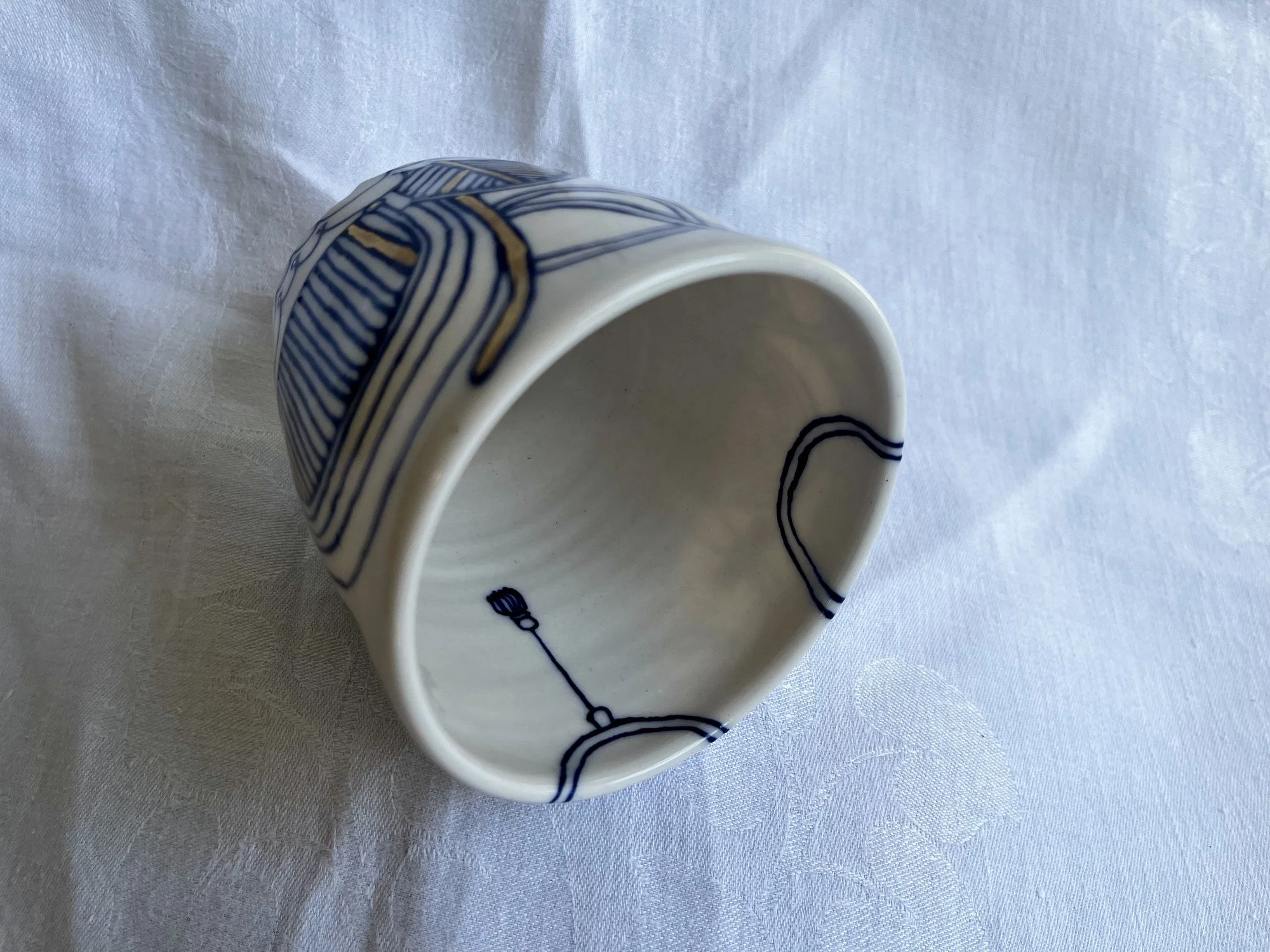 Interior of wheel-thrown porcelain tumbler No. 003, hand-painted in Naples, Florida
