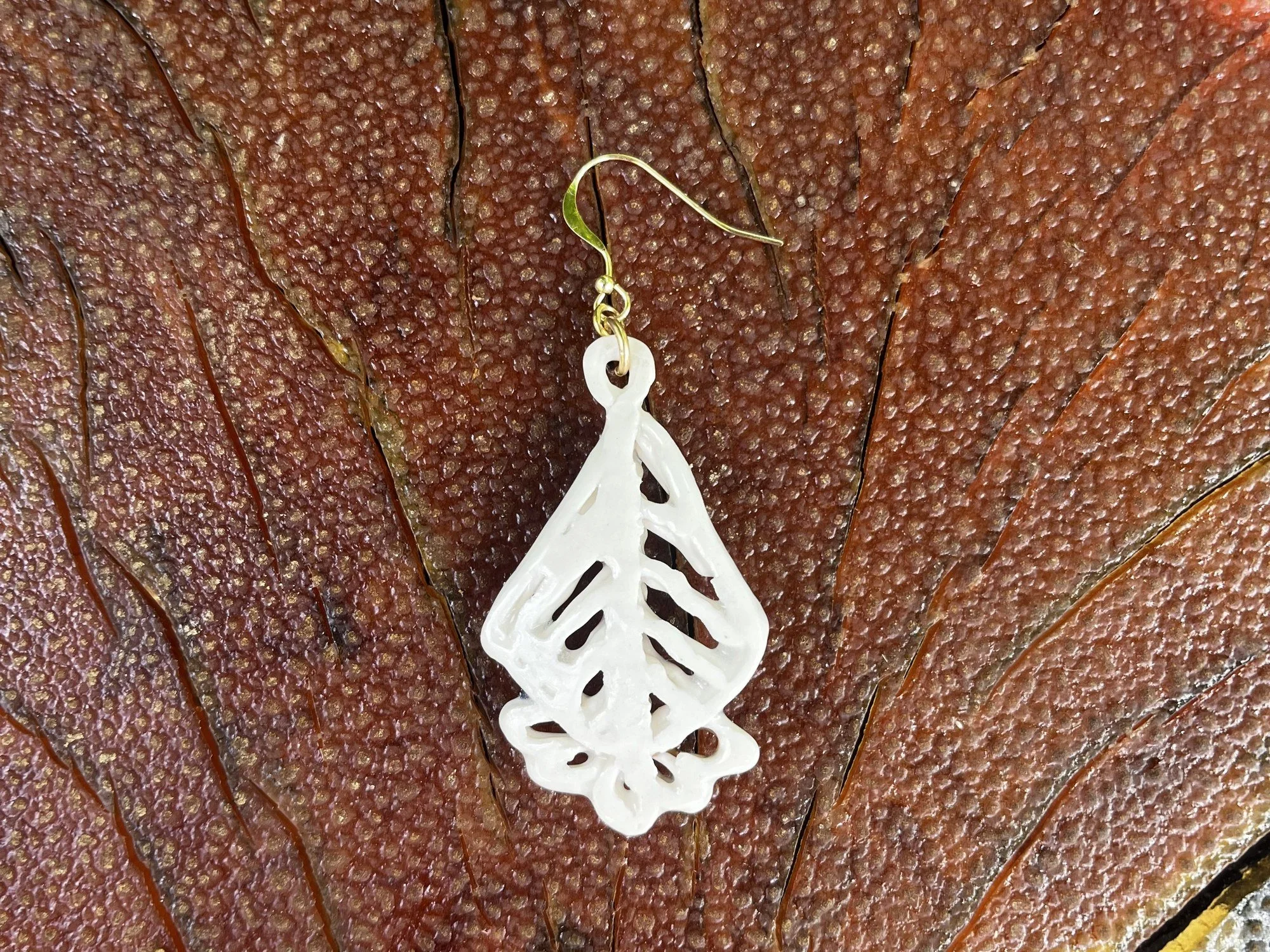 Back of handmade porcelain earring No. 002 on a 14k gold-filled ear wire