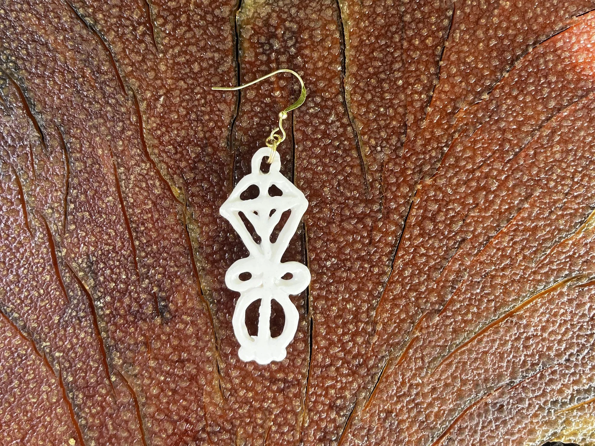 Back of handmade porcelain earring No. 005 on a 14k gold-filled ear wire