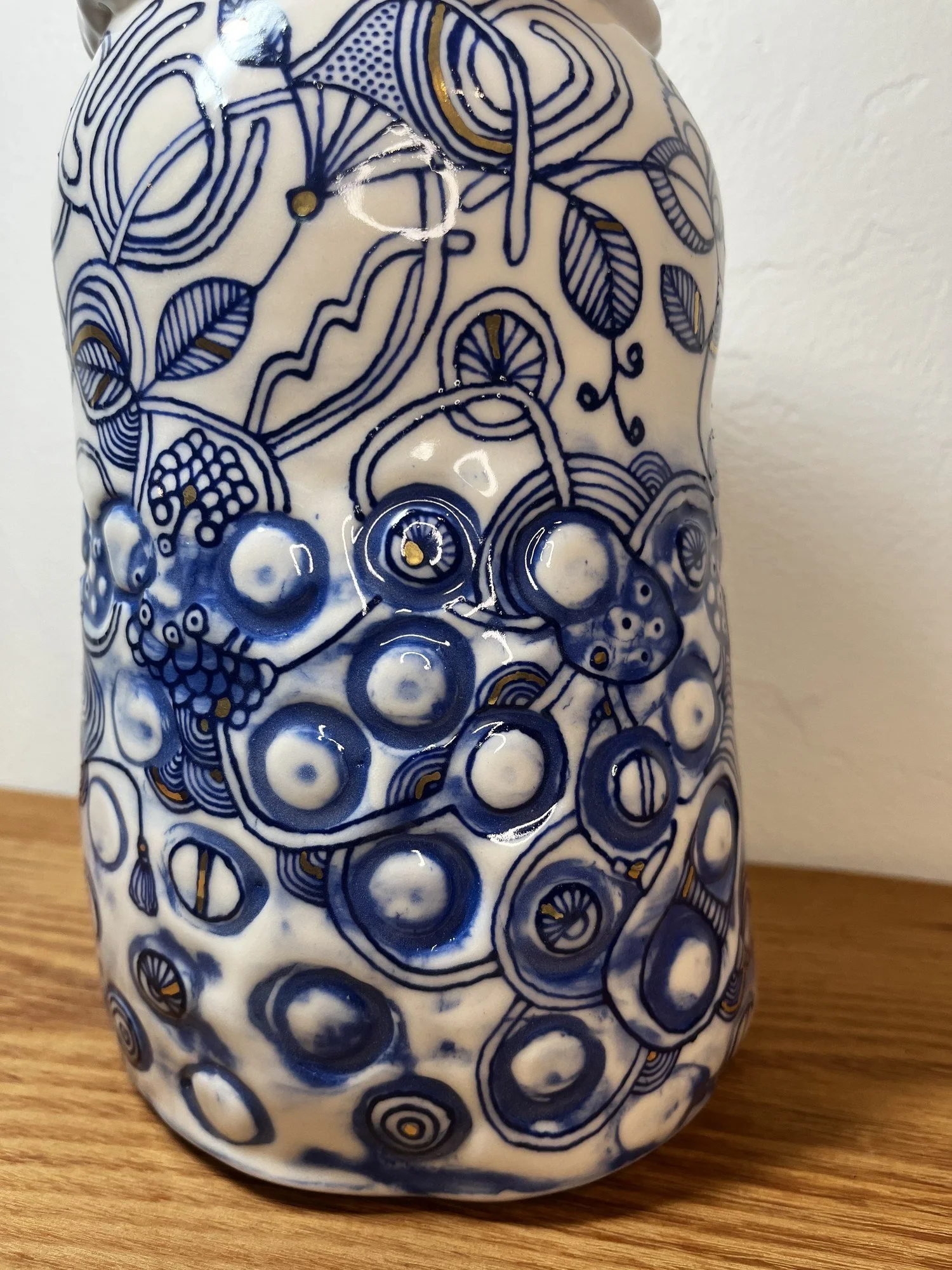 Cobalt blue and gold luster surface detail on porcelain vase No. 001